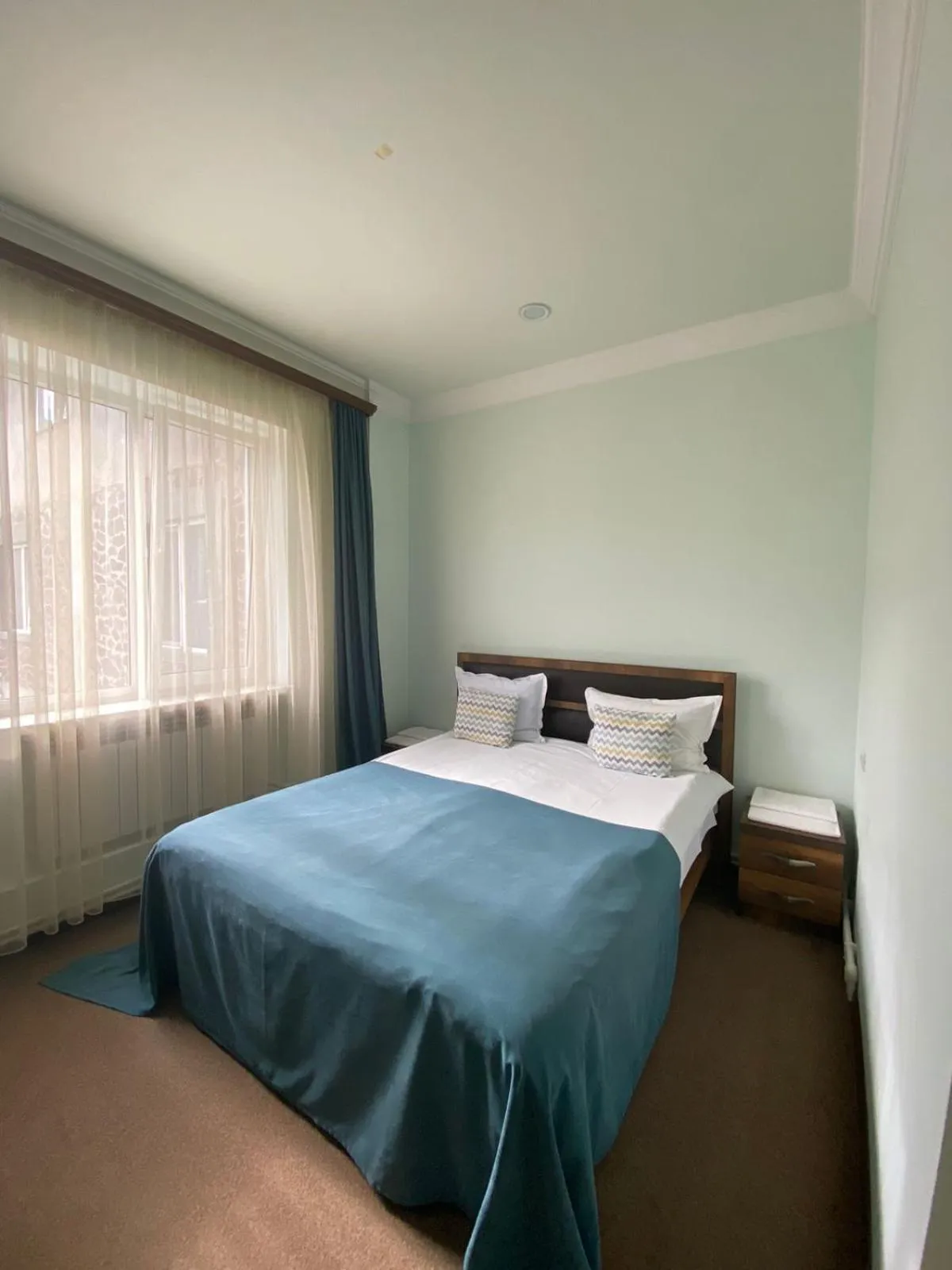 Bed in Mina Hotel