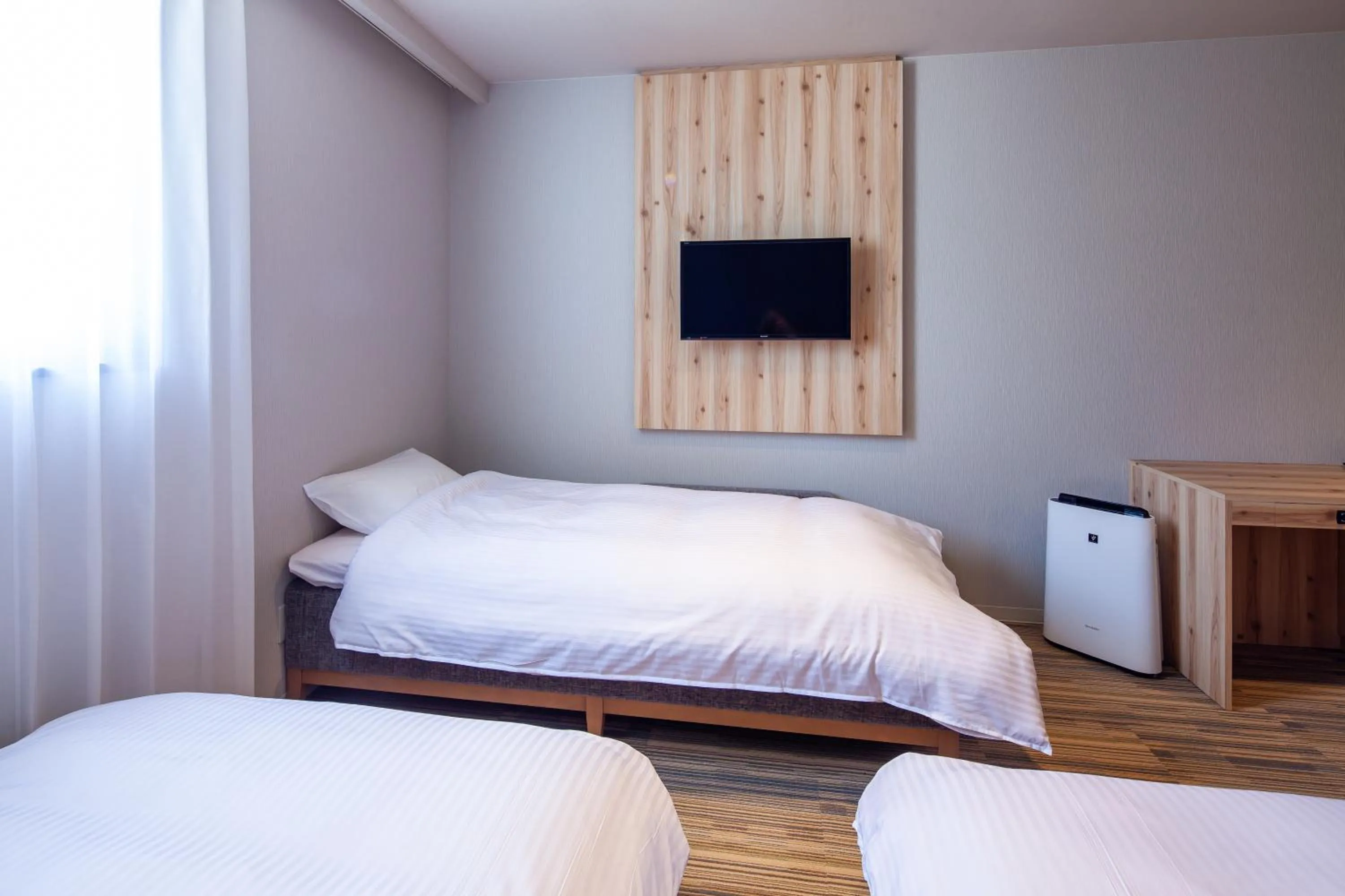 Photo of the whole room, Bed in Y's CABIN&HOTEL Naha Kokusai Street