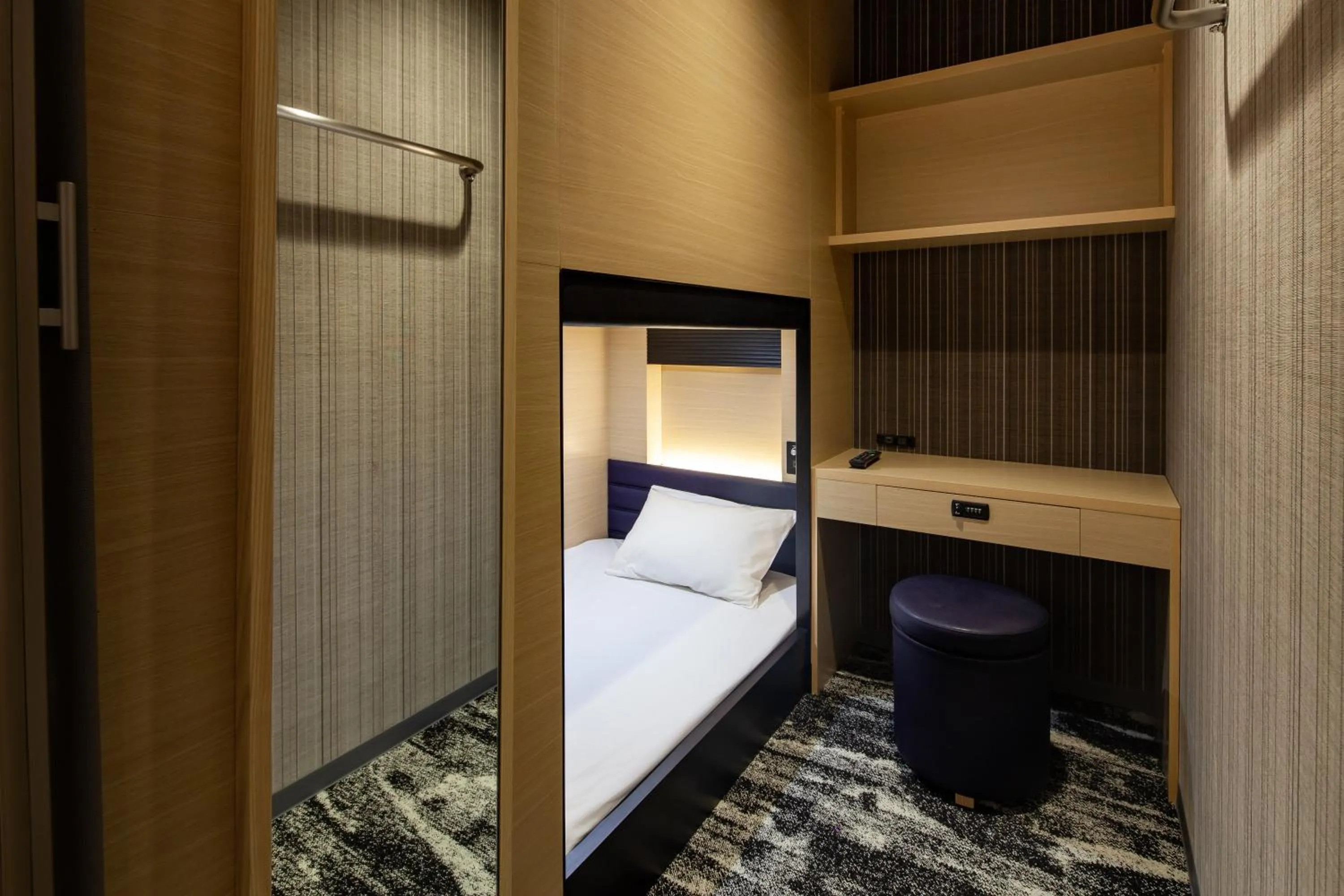 Photo of the whole room, Bed in Y's CABIN&HOTEL Naha Kokusai Street