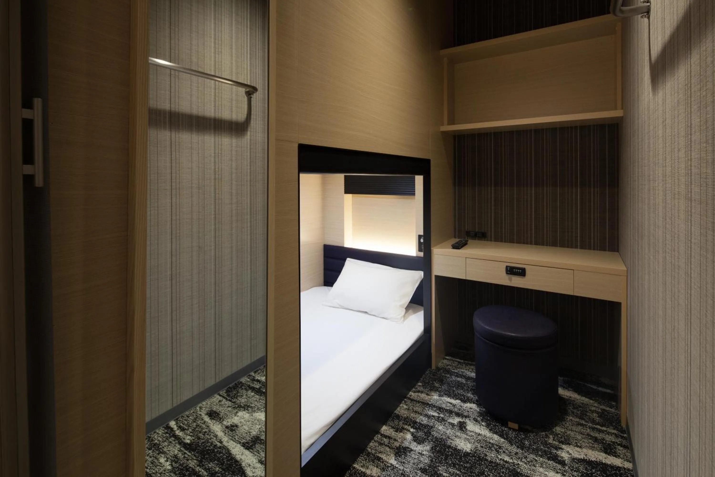 Bed in Y's CABIN&HOTEL Naha Kokusai Street