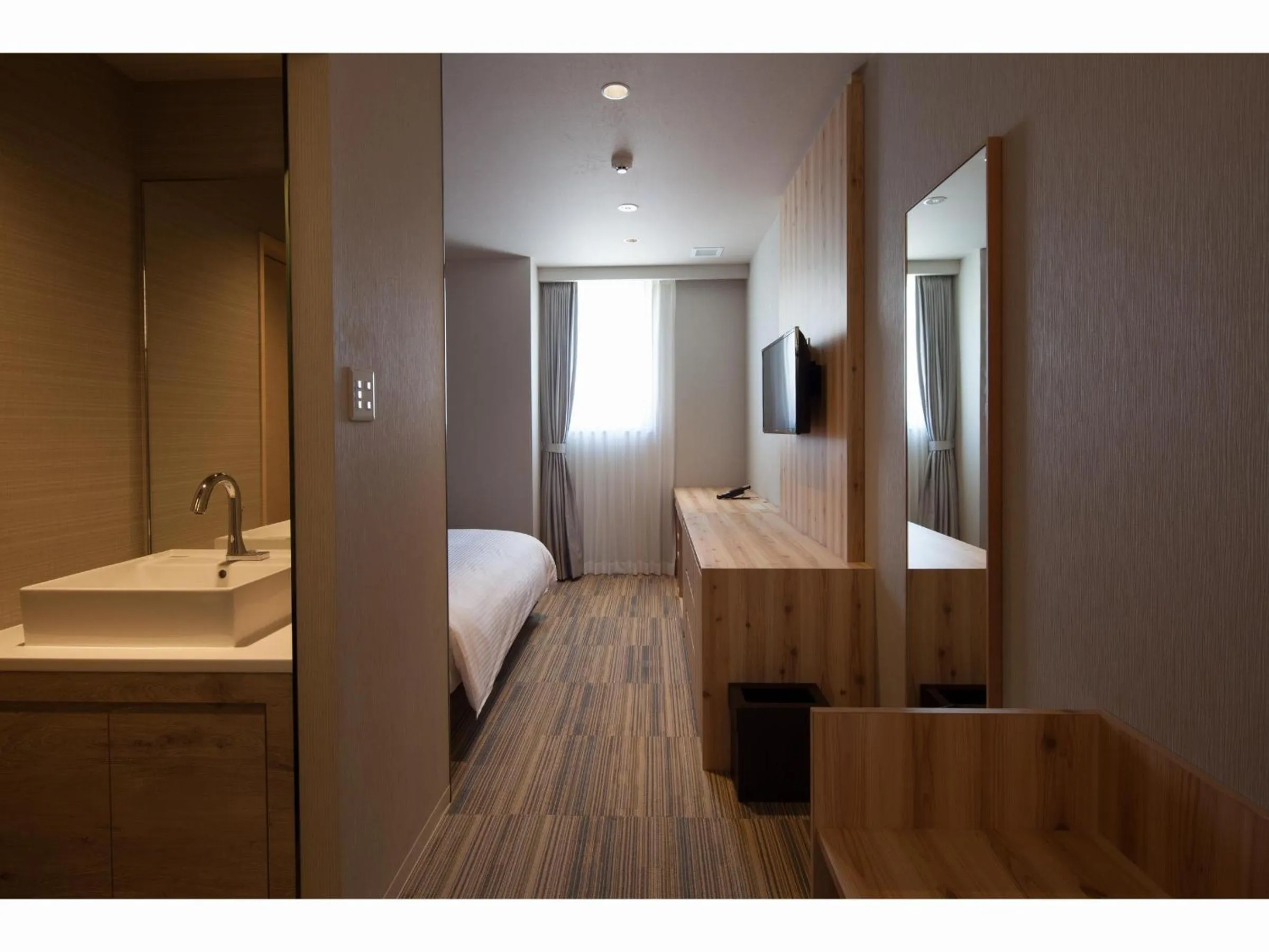 Bed in Y's CABIN&HOTEL Naha Kokusai Street