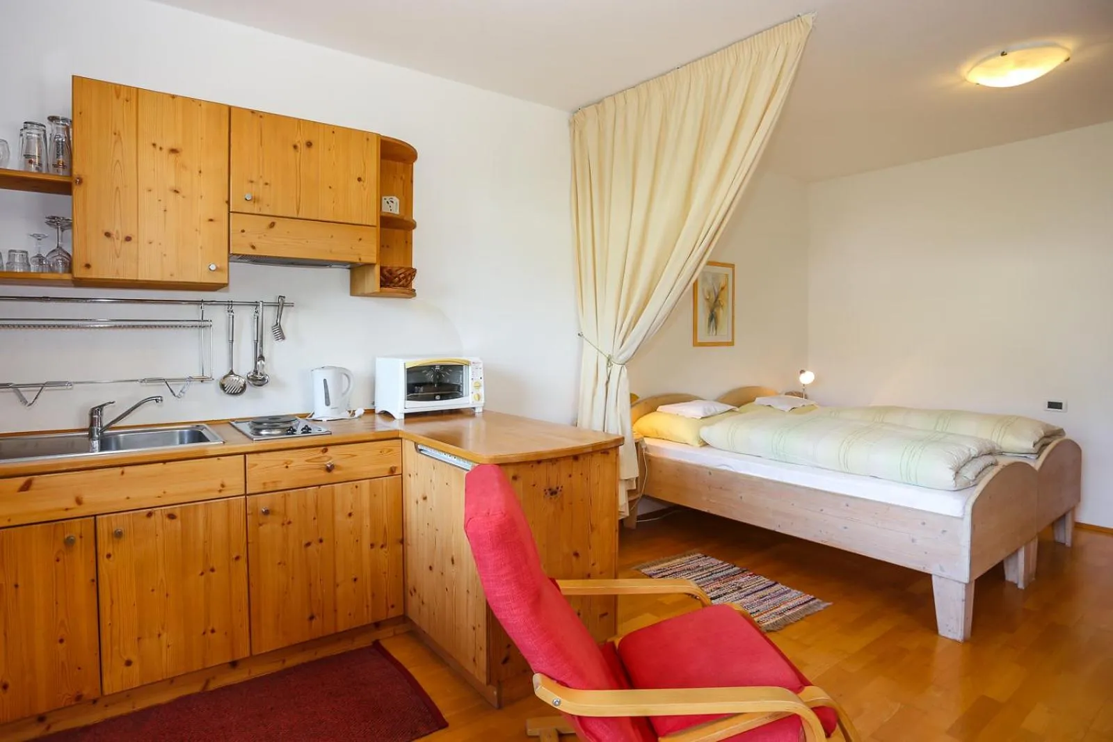 Kitchen or kitchenette, Bed in Bio Hotel Kaufmann