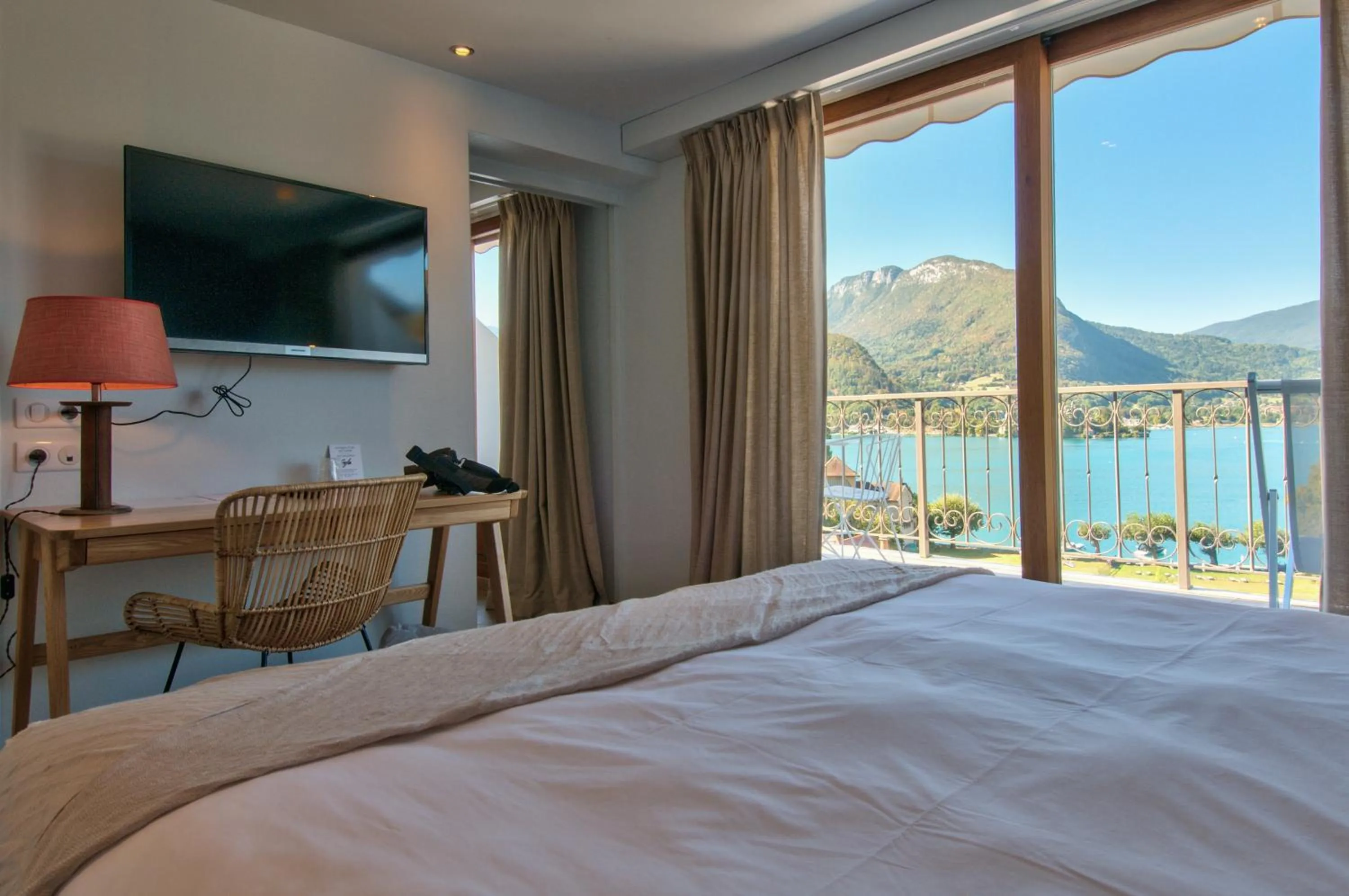 Photo of the whole room, Bed in Hôtel Beau Site Talloires B SPA