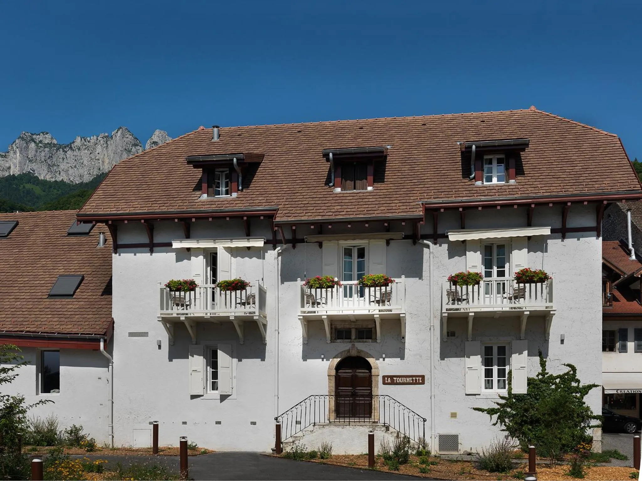 Property building in Hôtel Beau Site Talloires B SPA