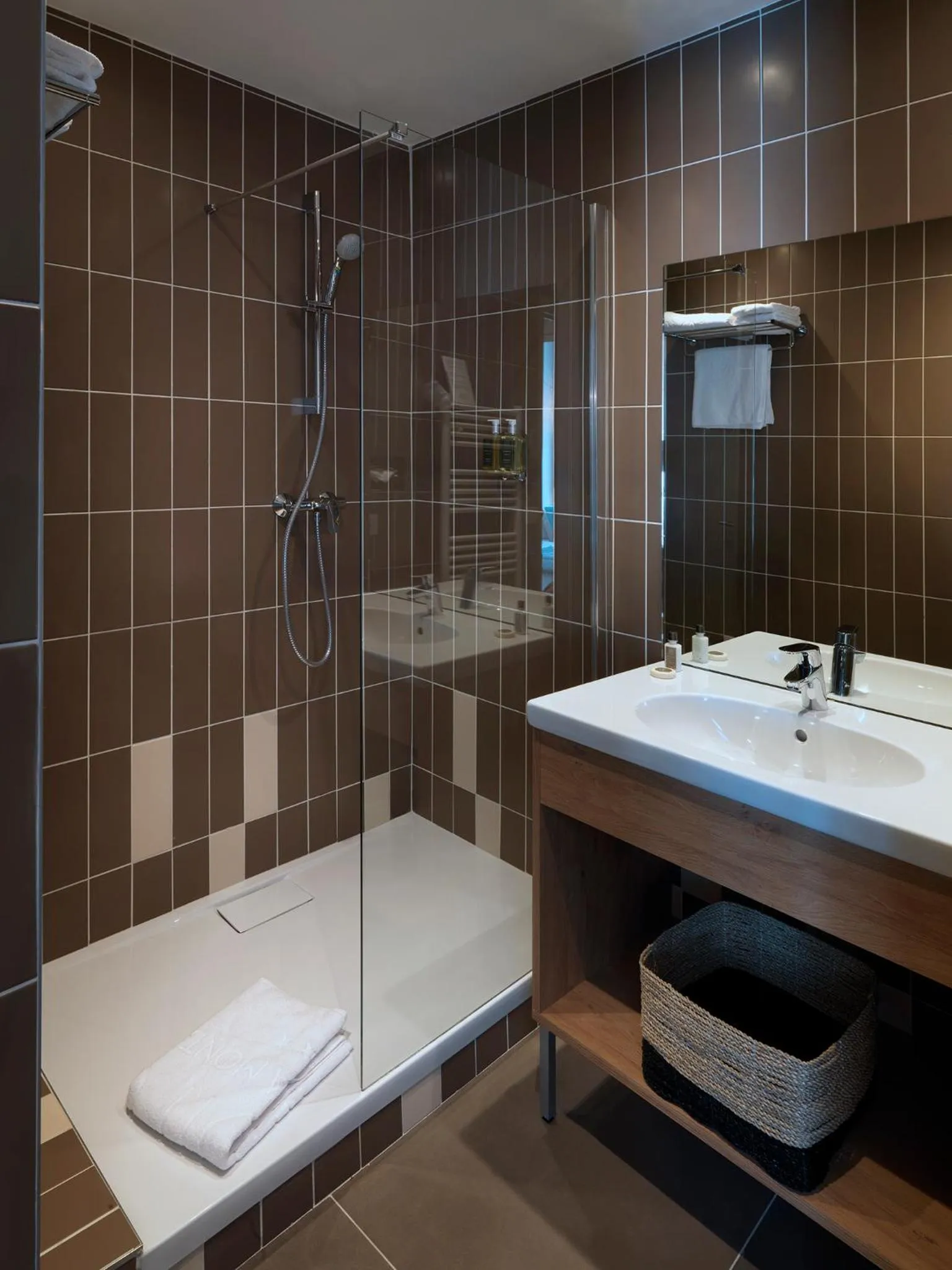 Bathroom in Hôtel Beau Site Talloires B SPA