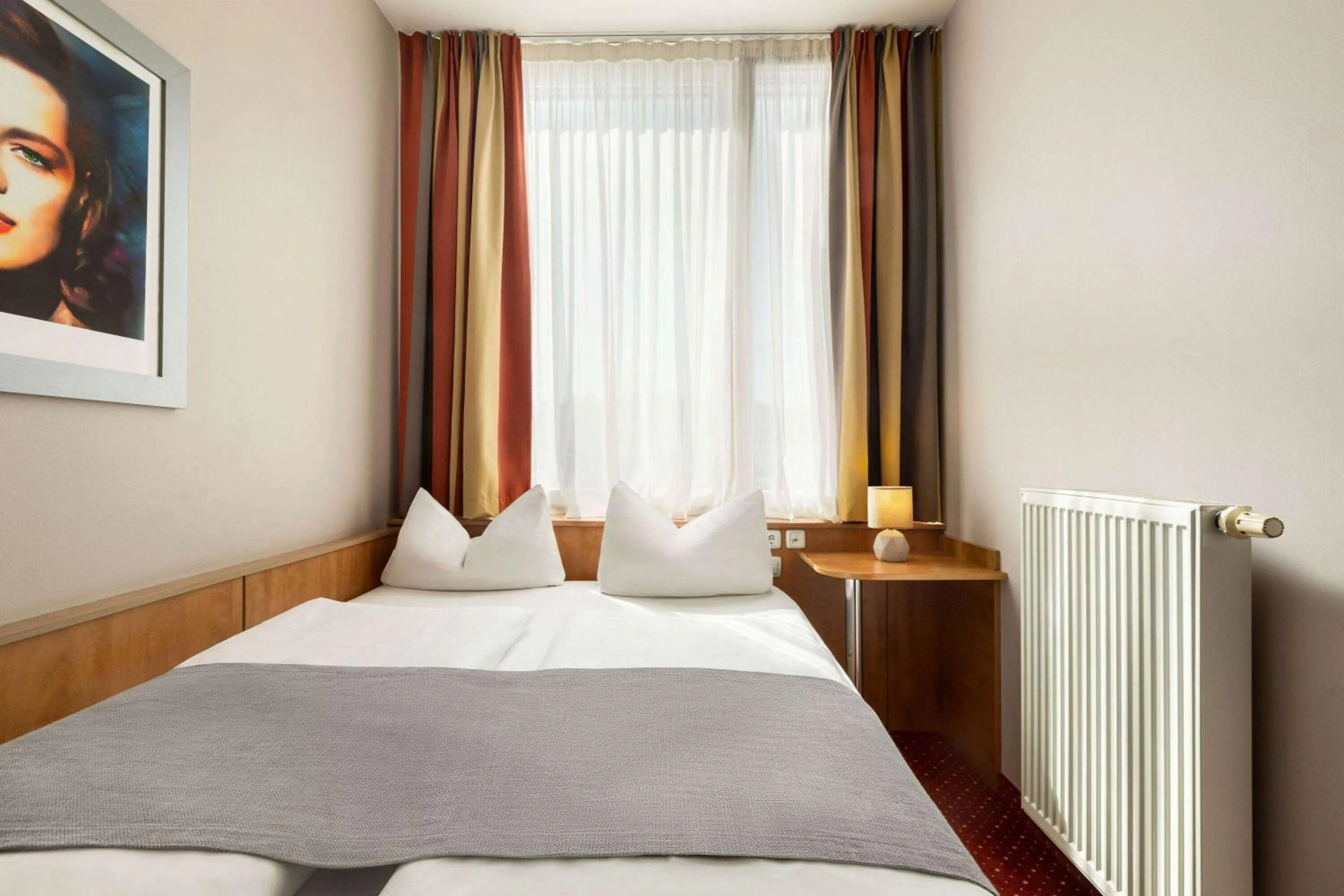 Photo of the whole room, Bed in Amedia Express Passau, Trademark Collection by Wyndham