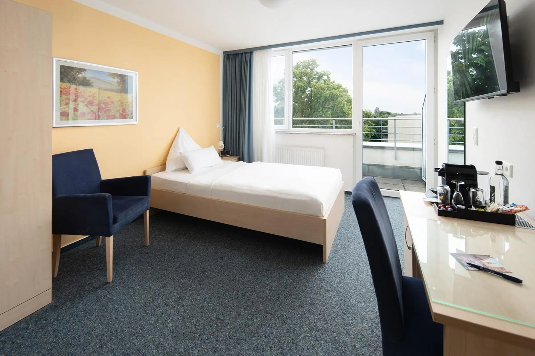 Photo of the whole room, Bed in Johanniter Gästehaus