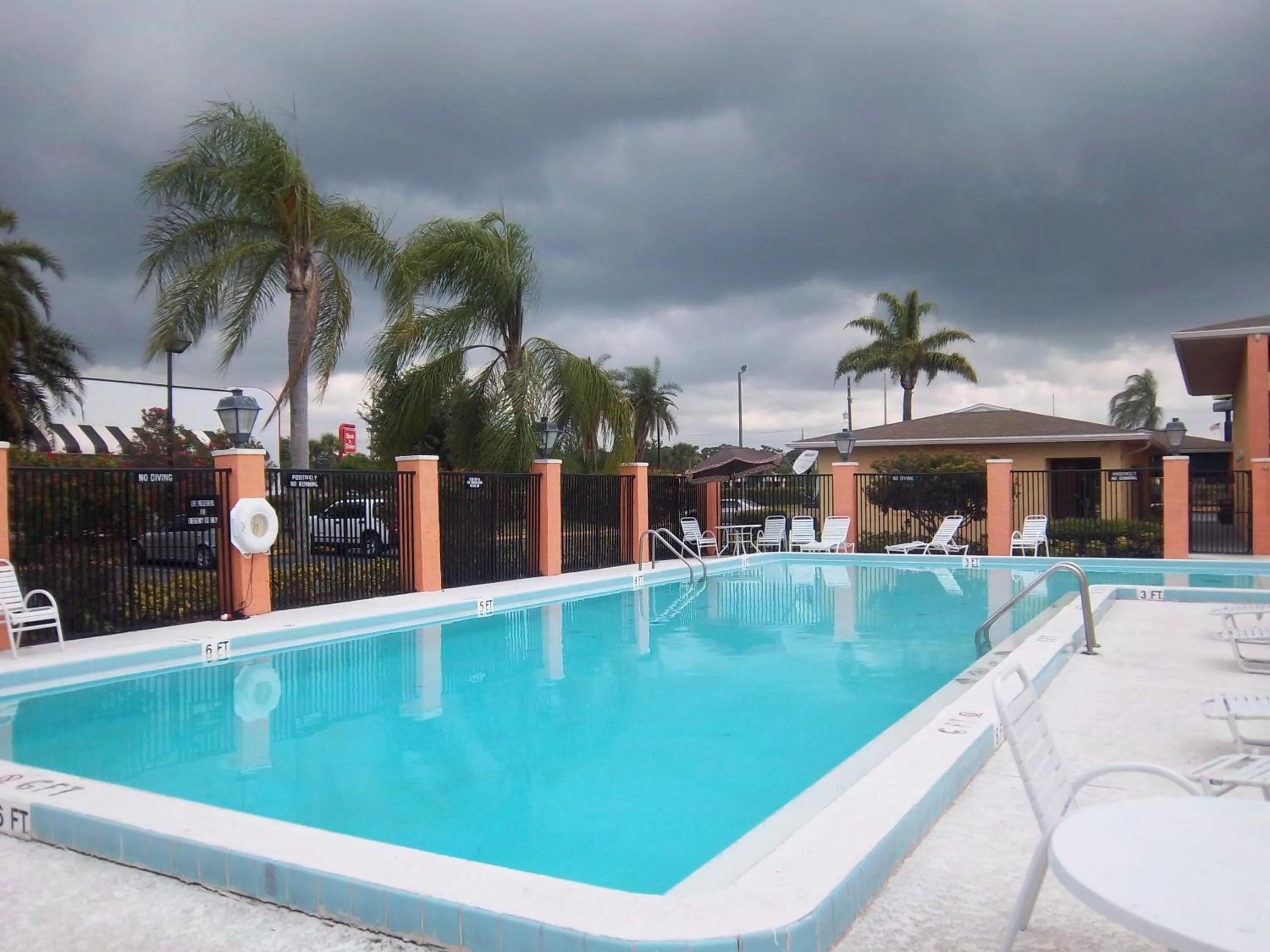 Swimming pool in Americas Best Value Inn Florida Turnpike & I-95
