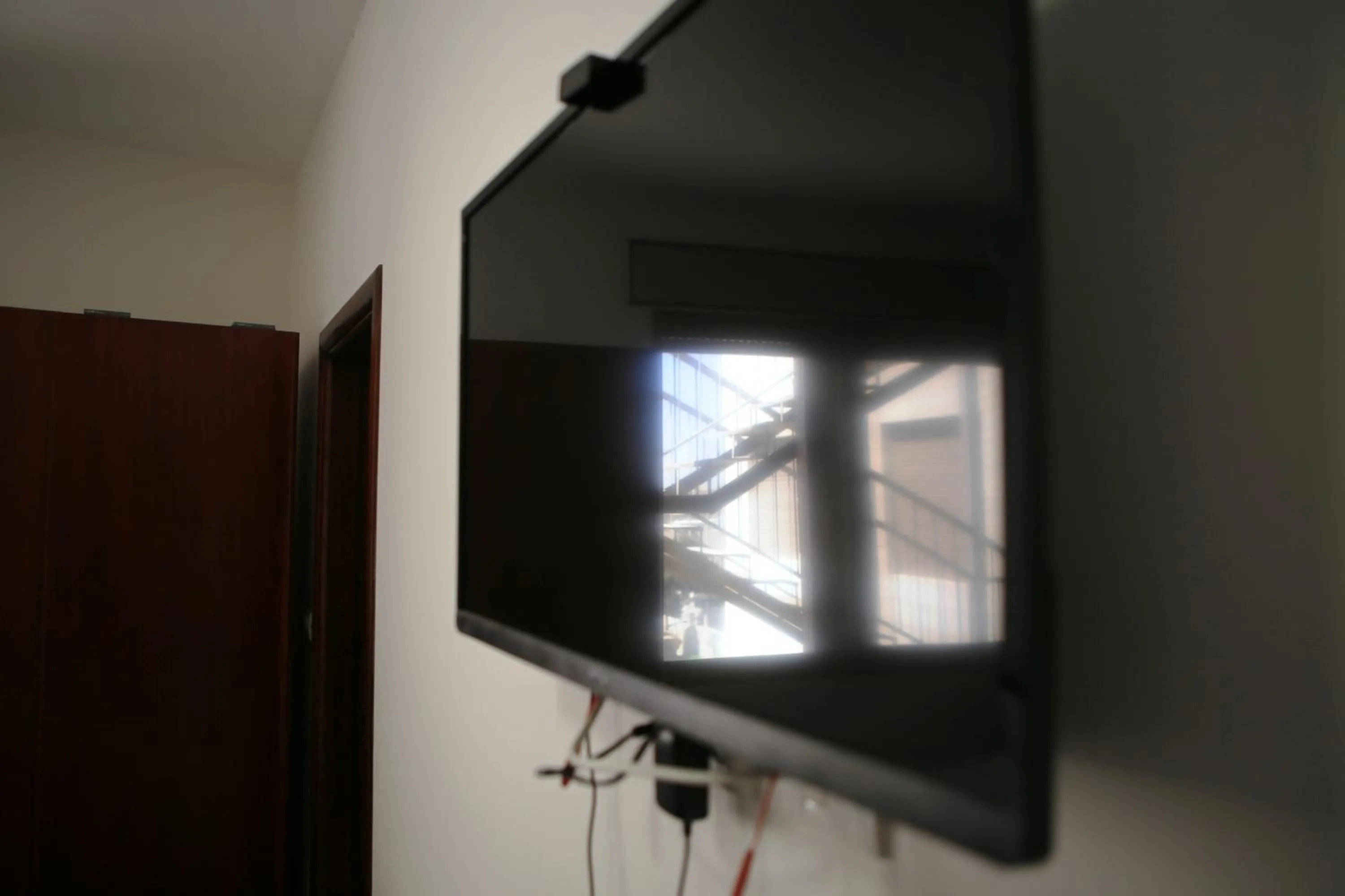 TV and multimedia in Alrowwad Guest House