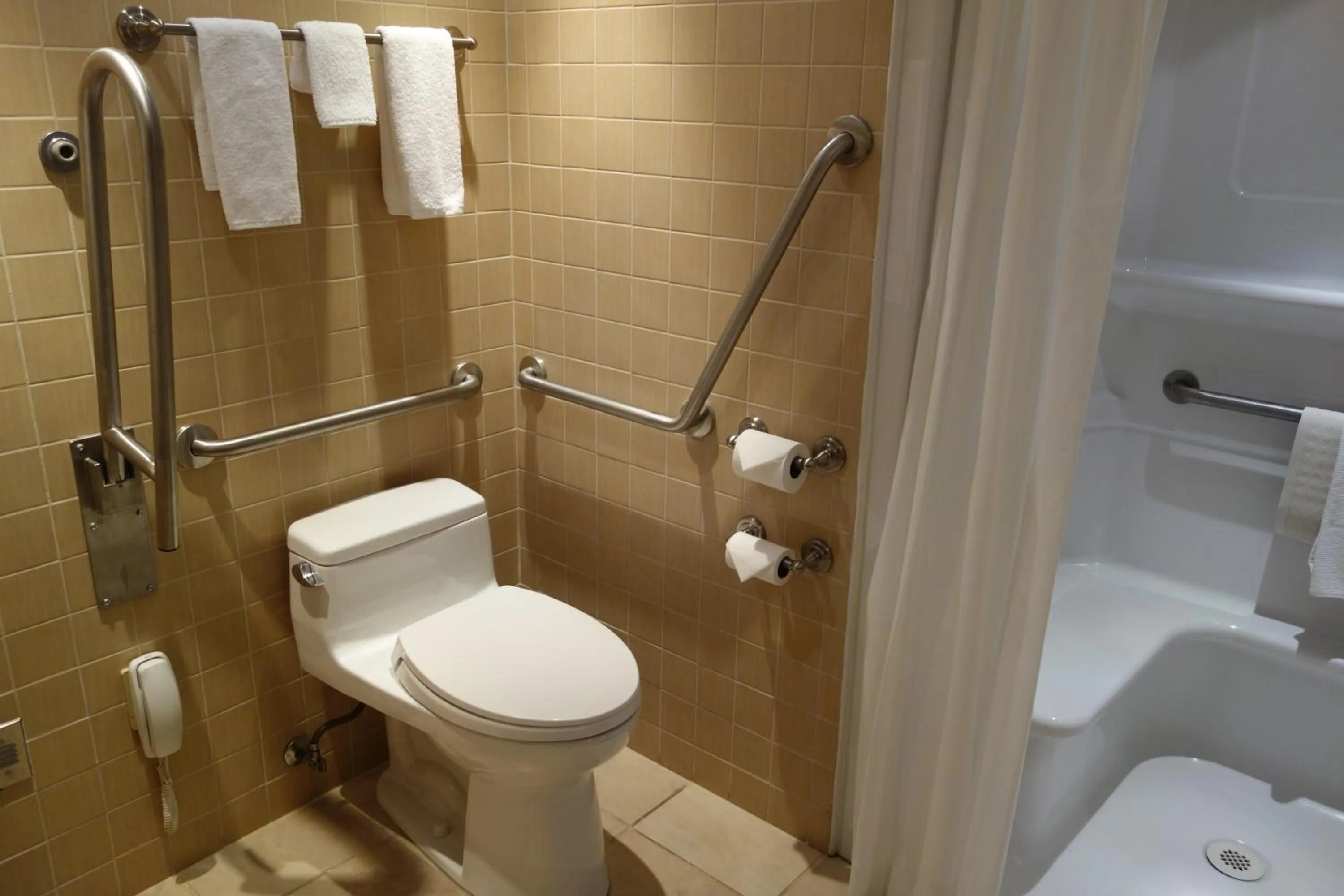 Bed in Chateau Louis Hotel & Conference Centre