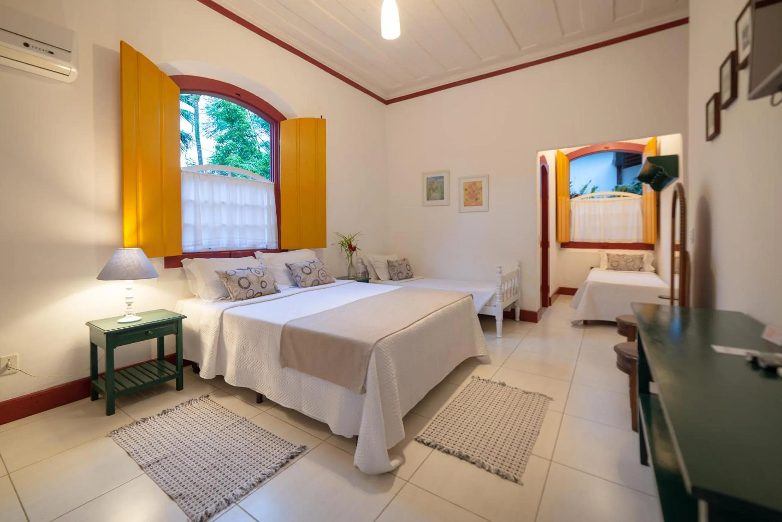 Photo of the whole room, Bed in Pousada Chácara Das Acácias