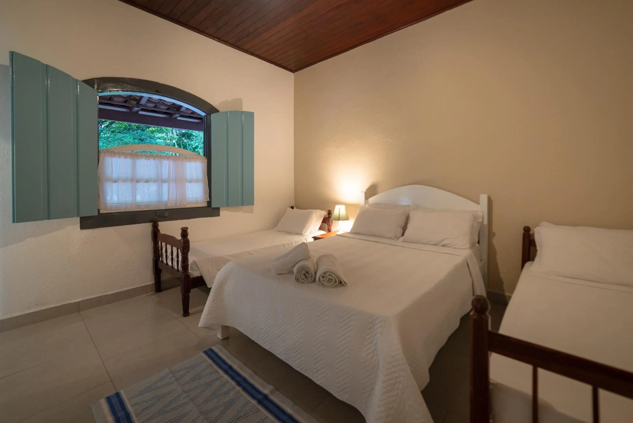 Bed in Pousada Chácara Das Acácias