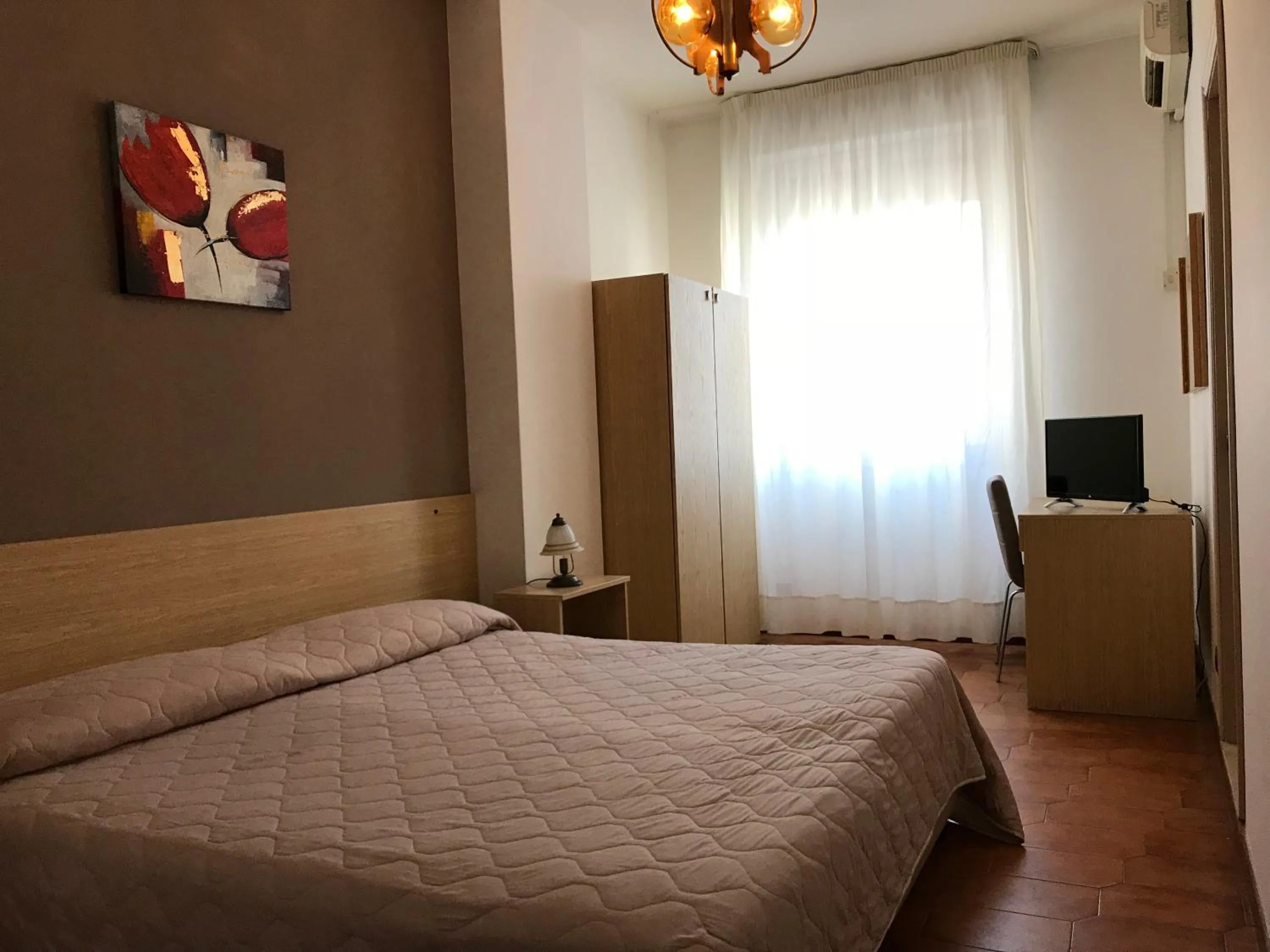 Bedroom in Hotel La Sirenetta