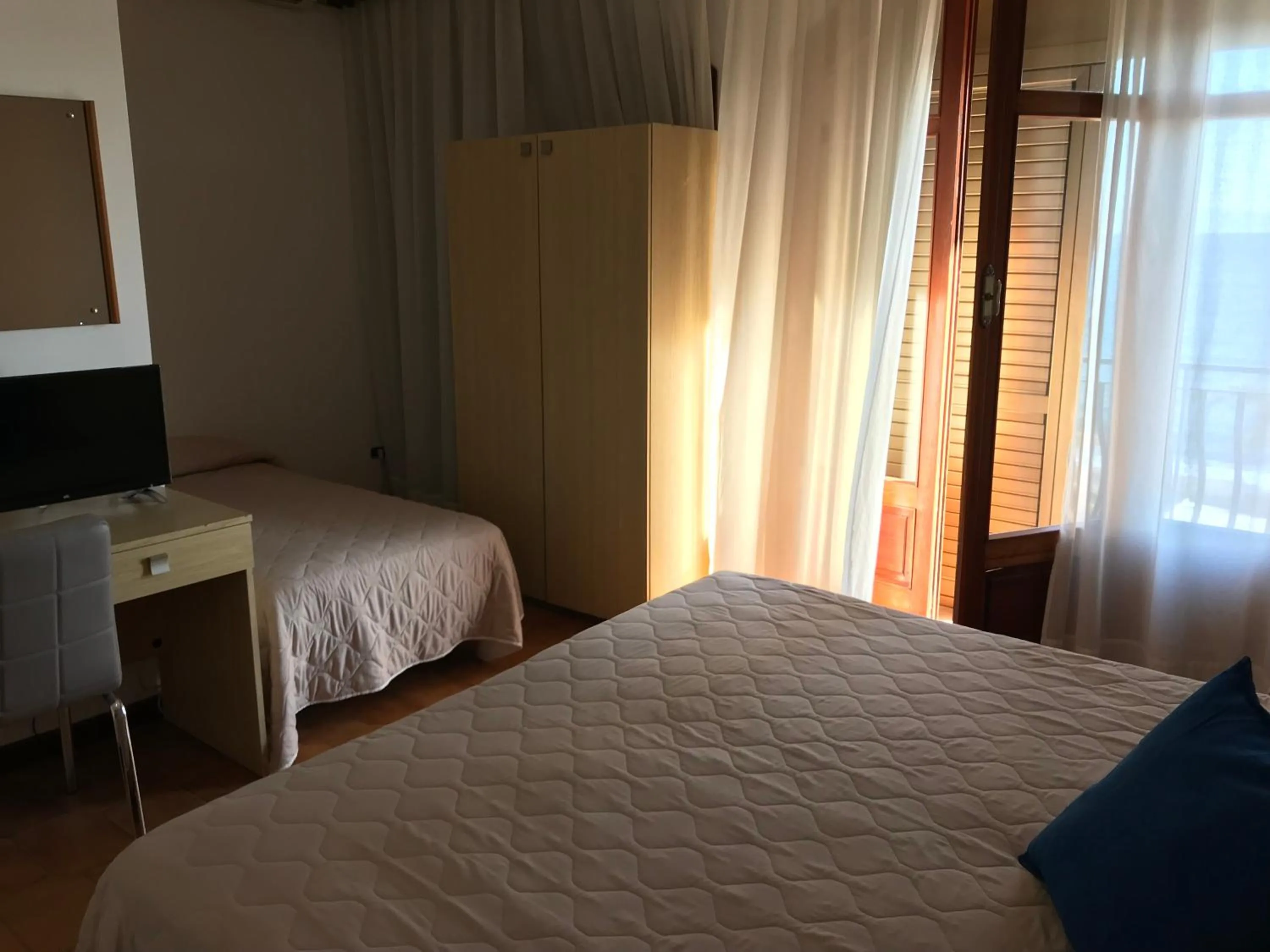 Bedroom in Hotel La Sirenetta