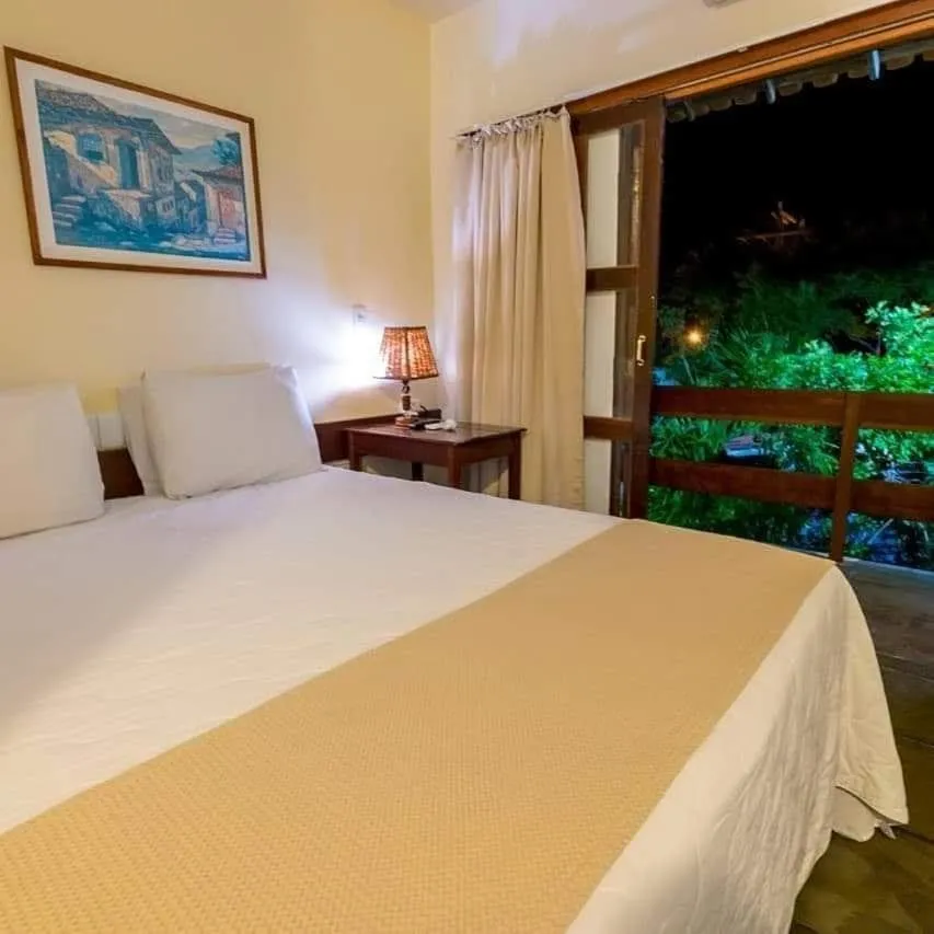 Balcony/Terrace, Bed in Pousada Guaratiba