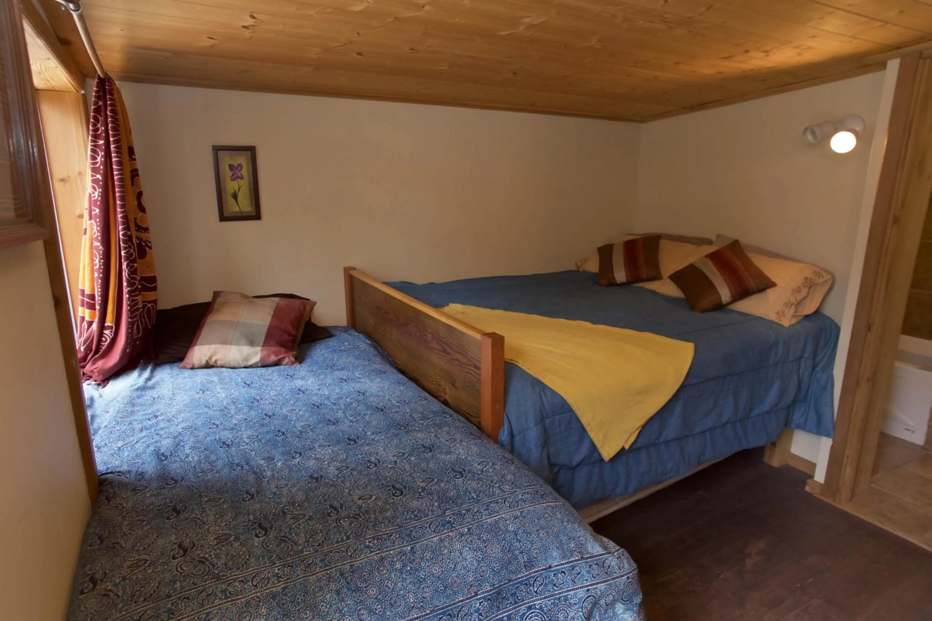 Bed in Halfmoon Haven Beach Cottage or Oceanview Suite