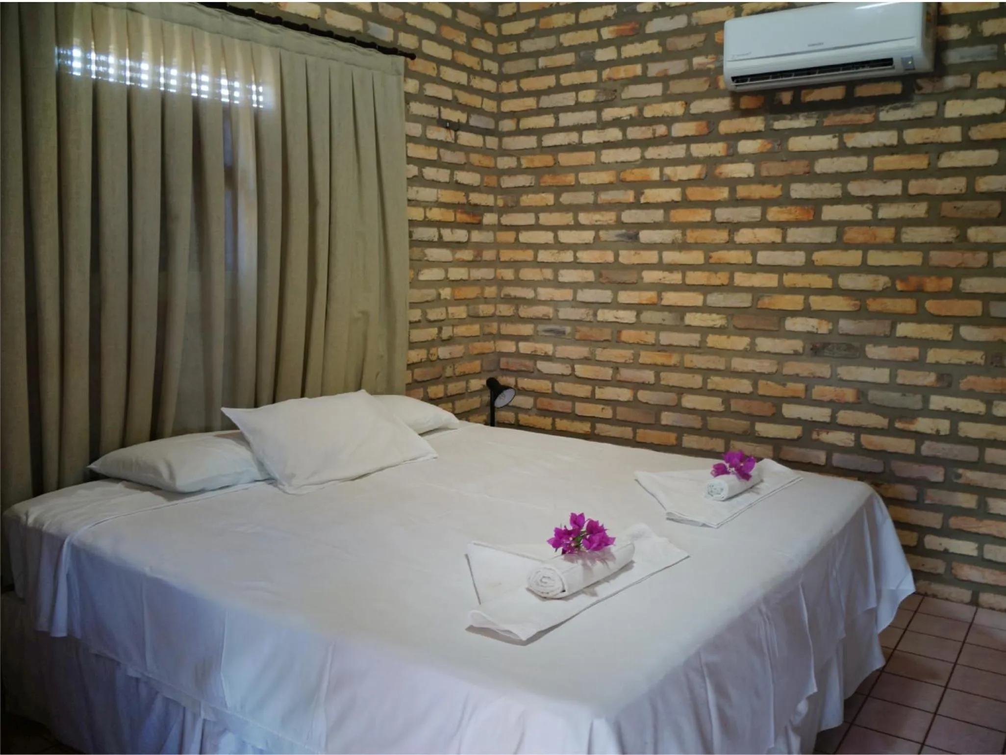 Bed in Pousada Mar de Estrelas