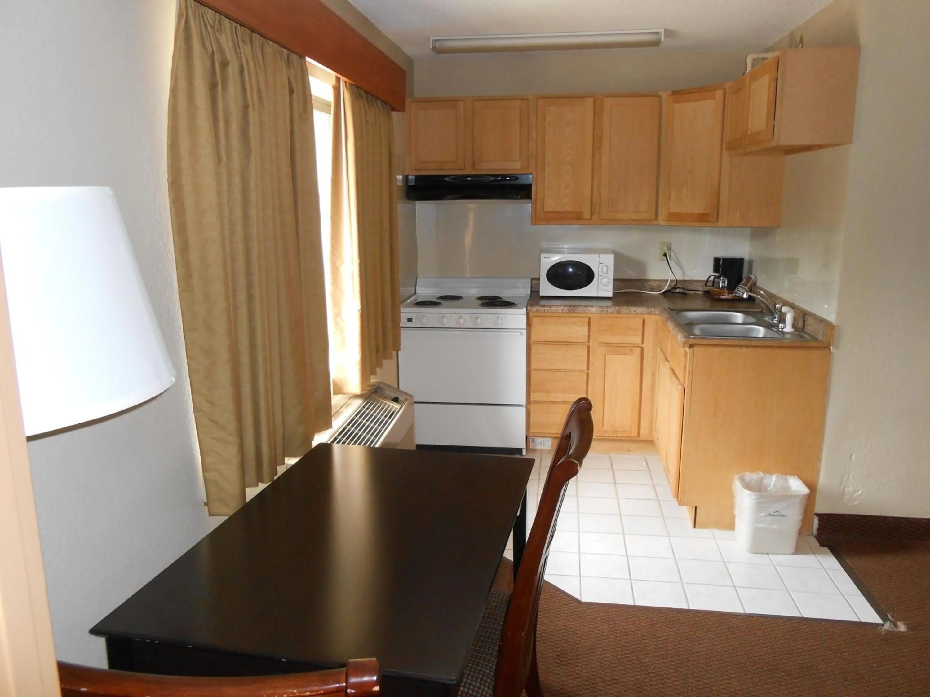 Kitchen or kitchenette in AmericInn by Wyndham Ham Lake