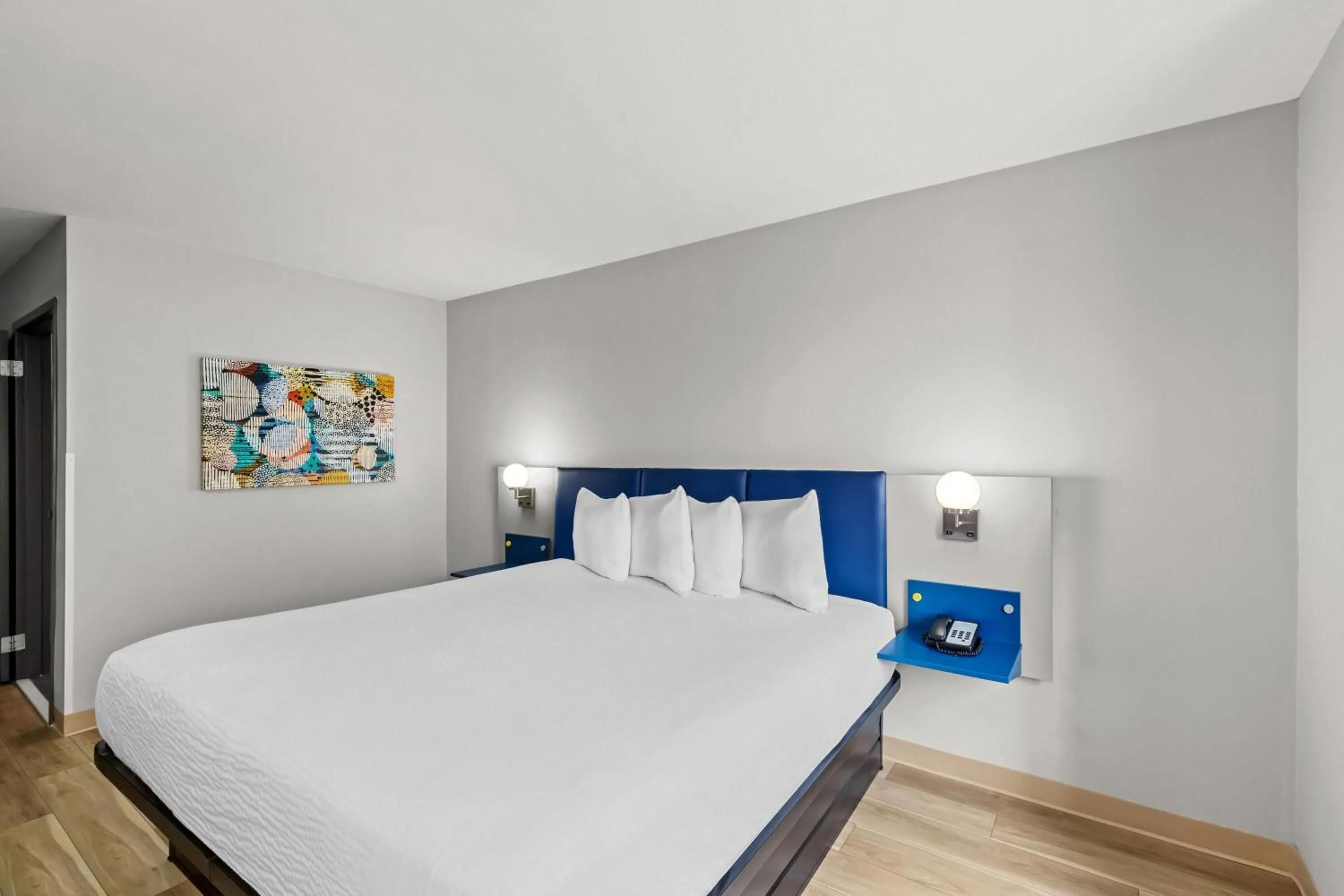 Bed in Microtel Inn & Suites by Wyndham Norcross