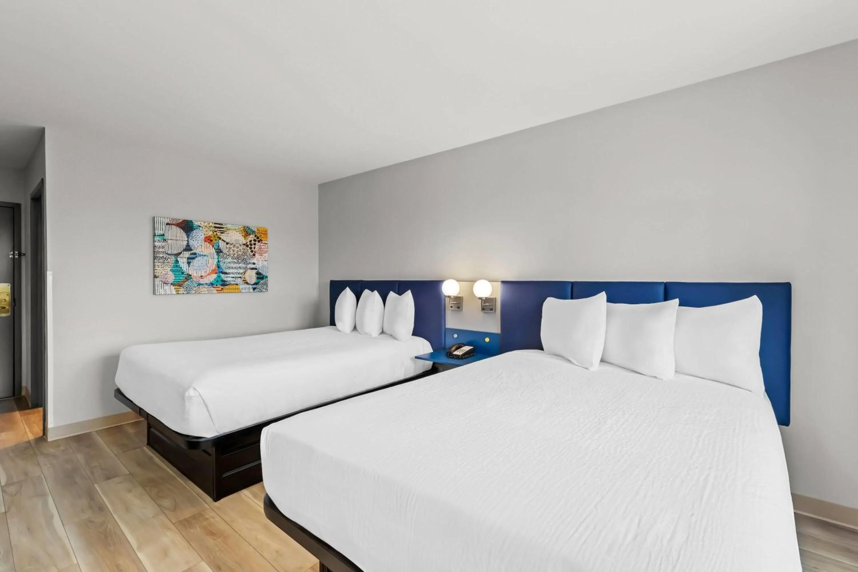 Bed in Microtel Inn & Suites by Wyndham Norcross