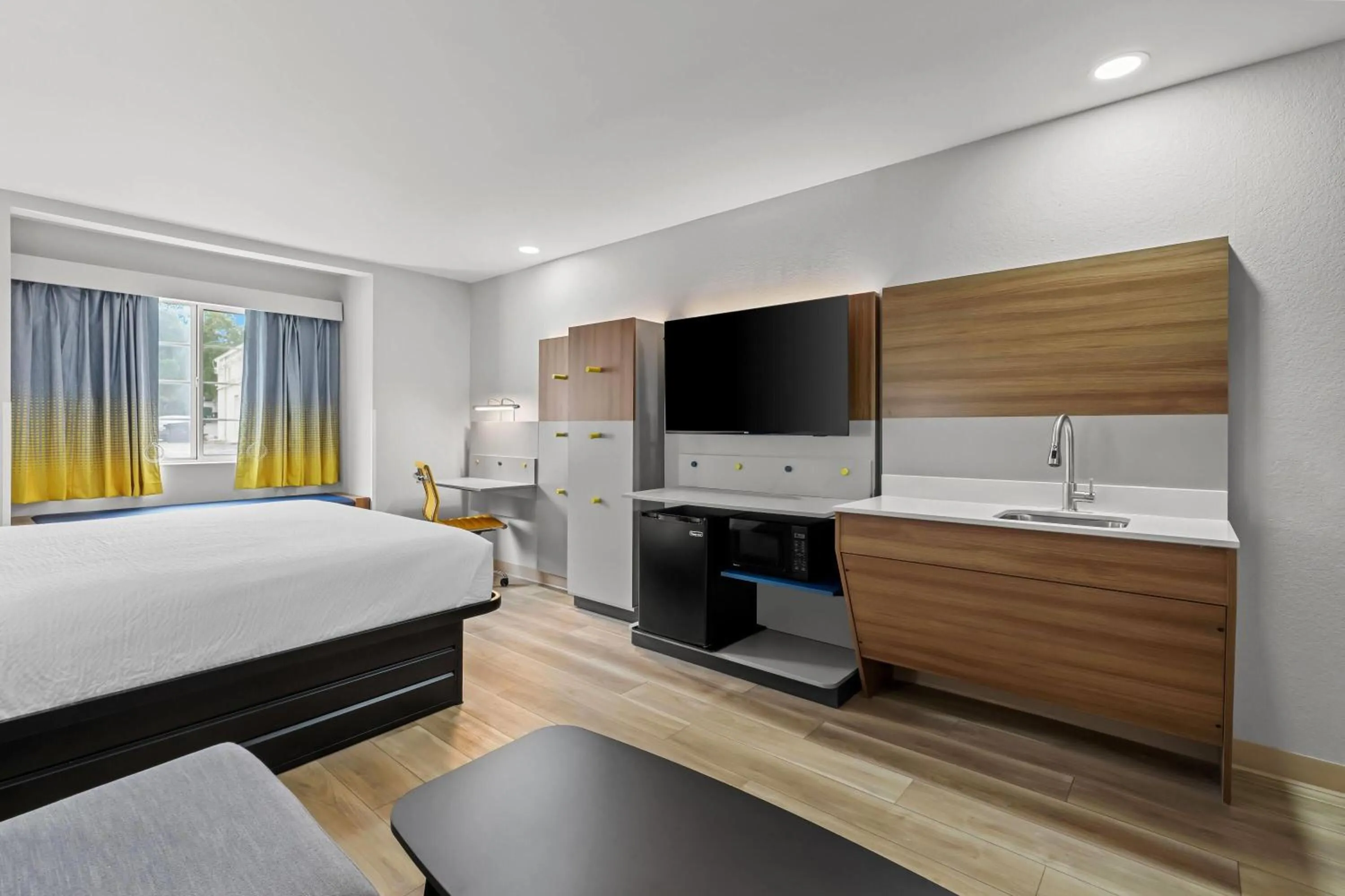 Bed in Microtel Inn & Suites by Wyndham Norcross