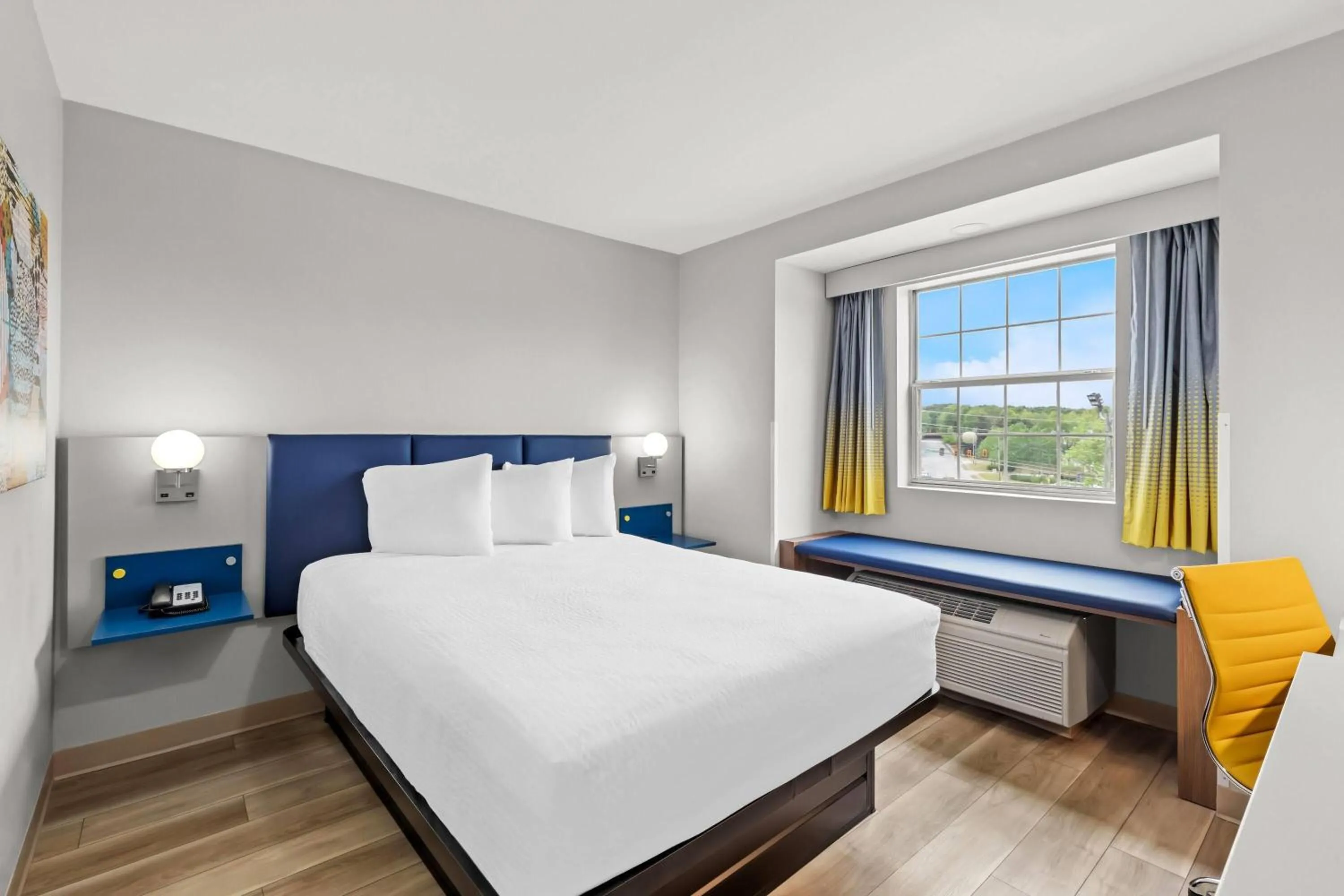 Bed in Microtel Inn & Suites by Wyndham Norcross