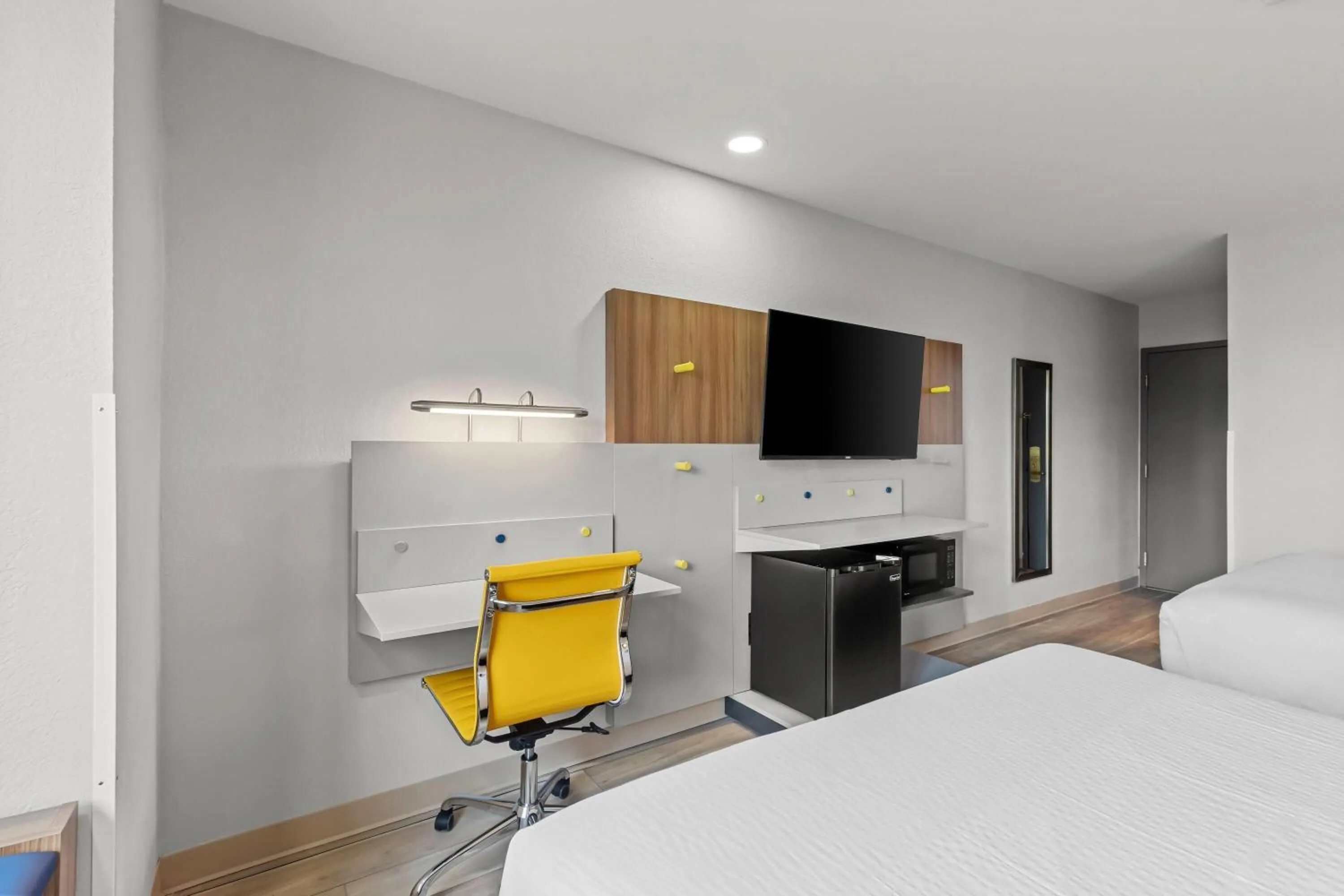 Bed in Microtel Inn & Suites by Wyndham Norcross