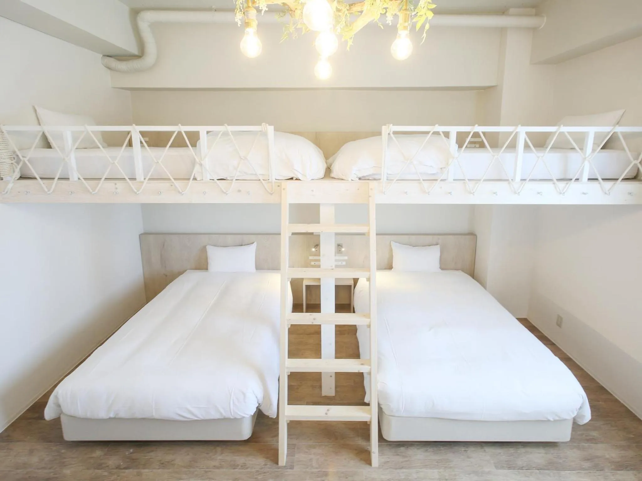 Bed in Ishigakijima Hotel Cucule