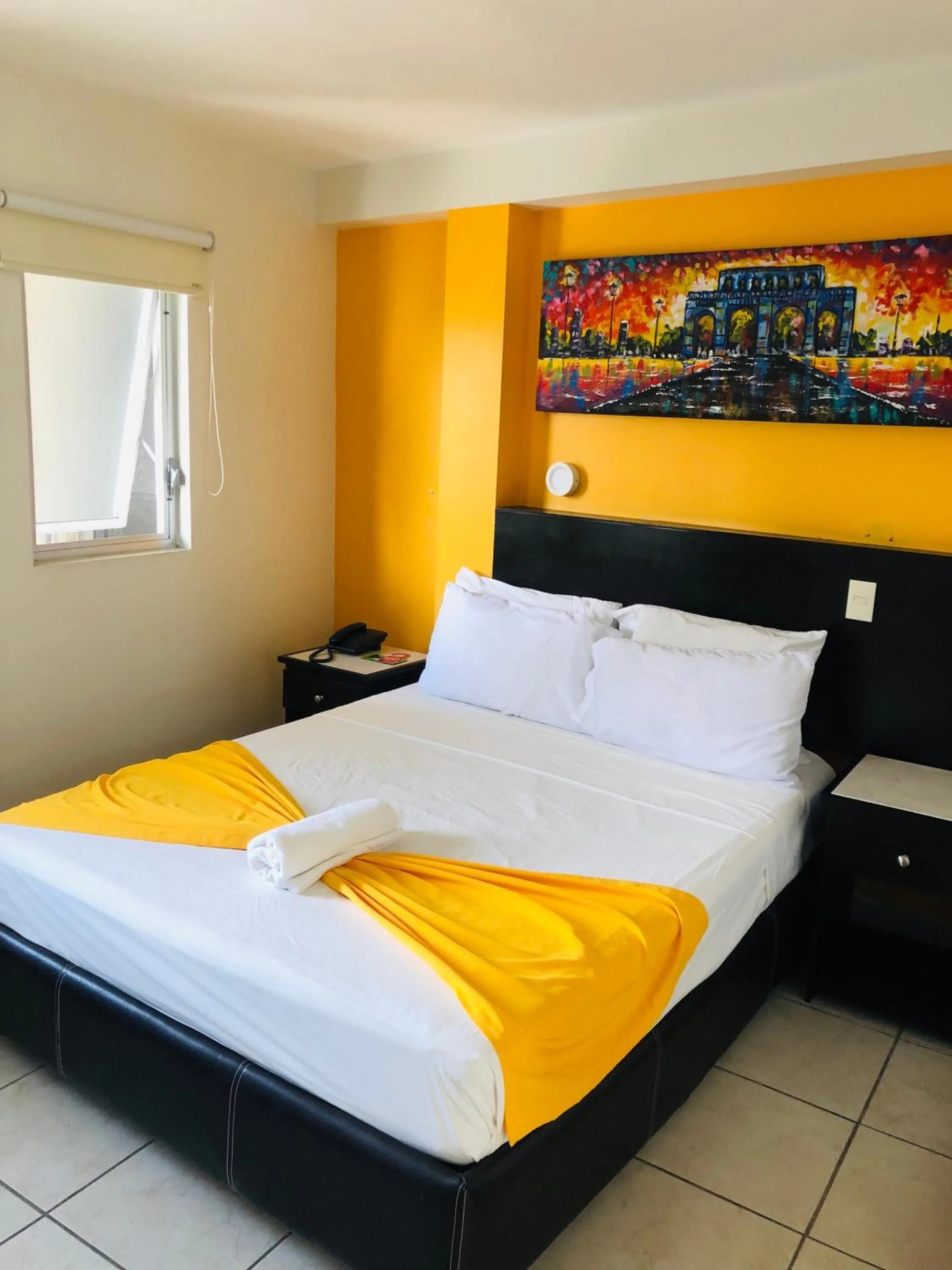 Bed in Hotel Belisario INN