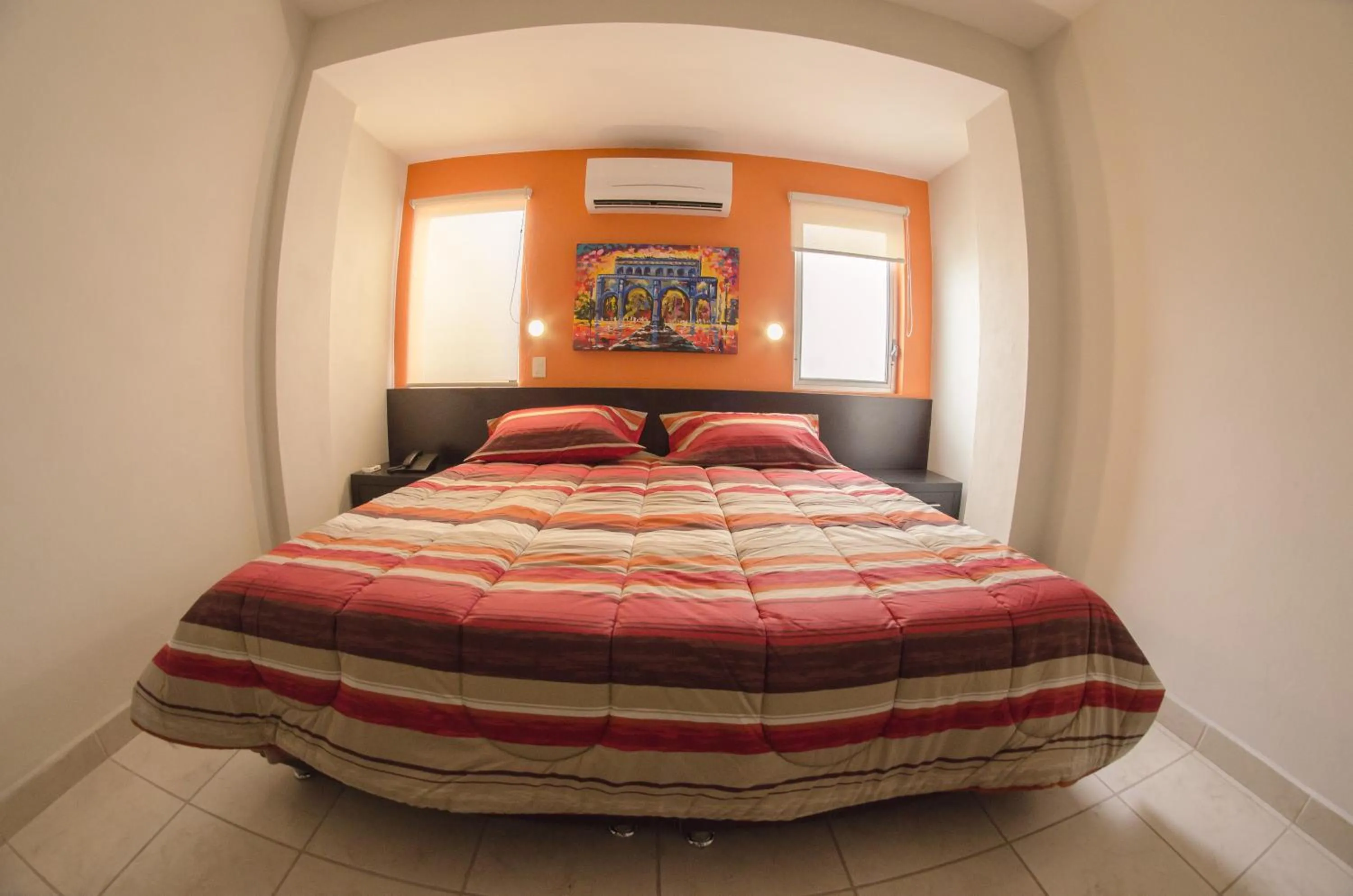 Bed in Hotel Belisario INN