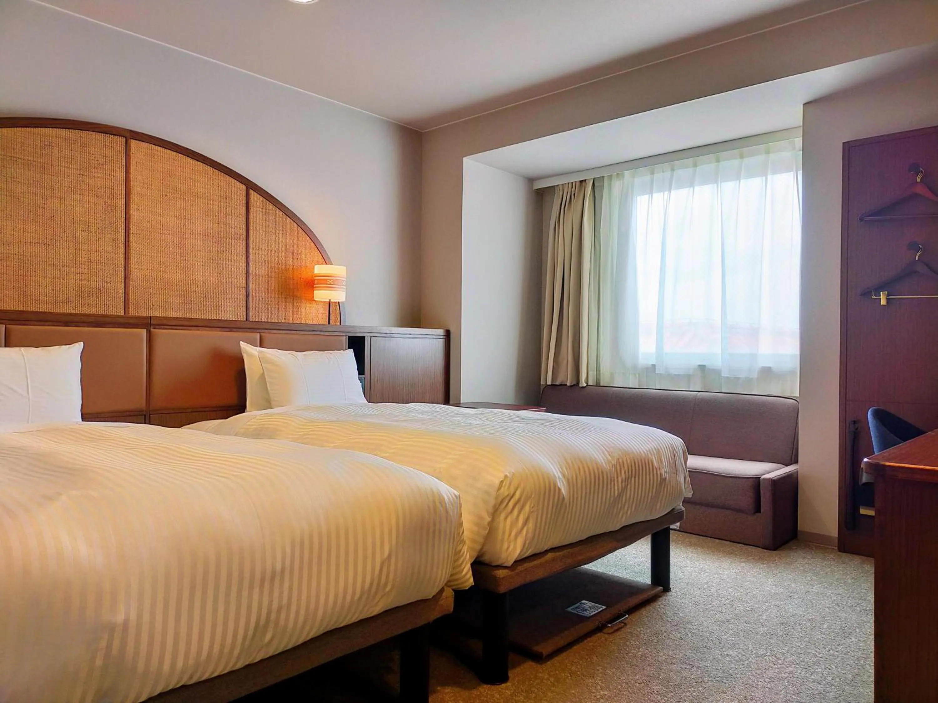 Photo of the whole room, Bed in Hotel Palm Royal Resort Kokusai Street