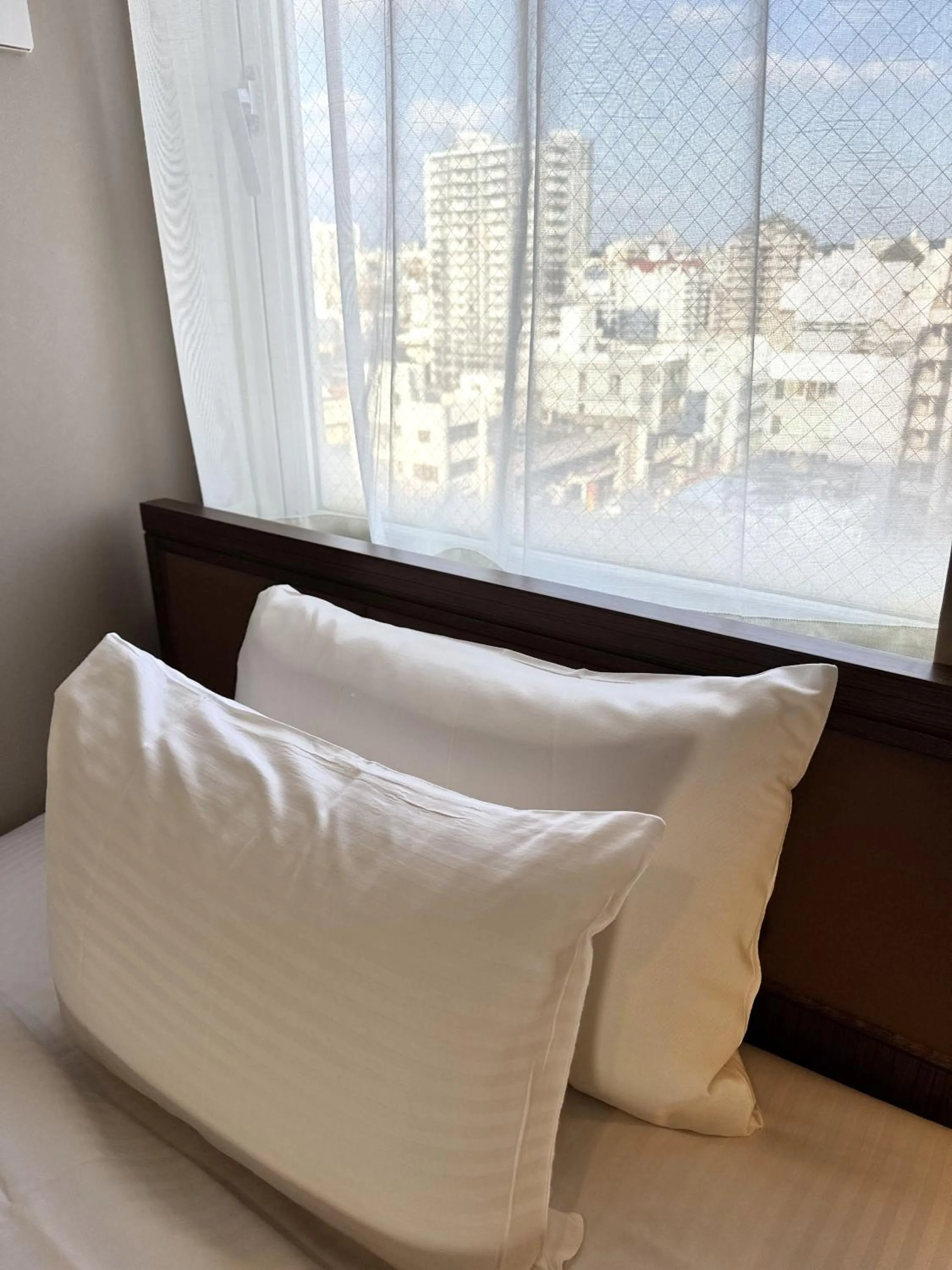 Bed in Hotel Palm Royal Resort Kokusai Street