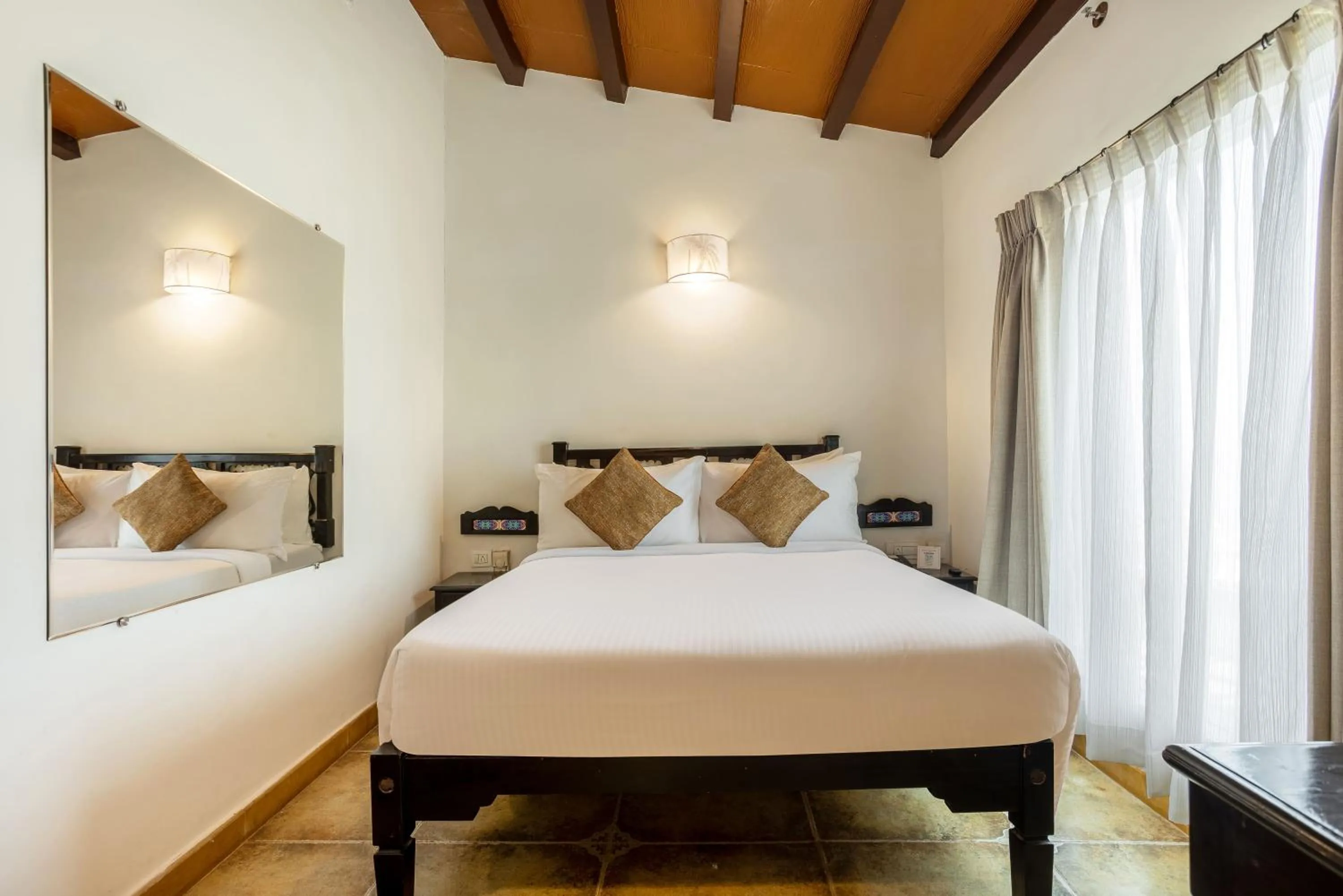 View (from property/room), Bed in Bogmallo Beach Resort