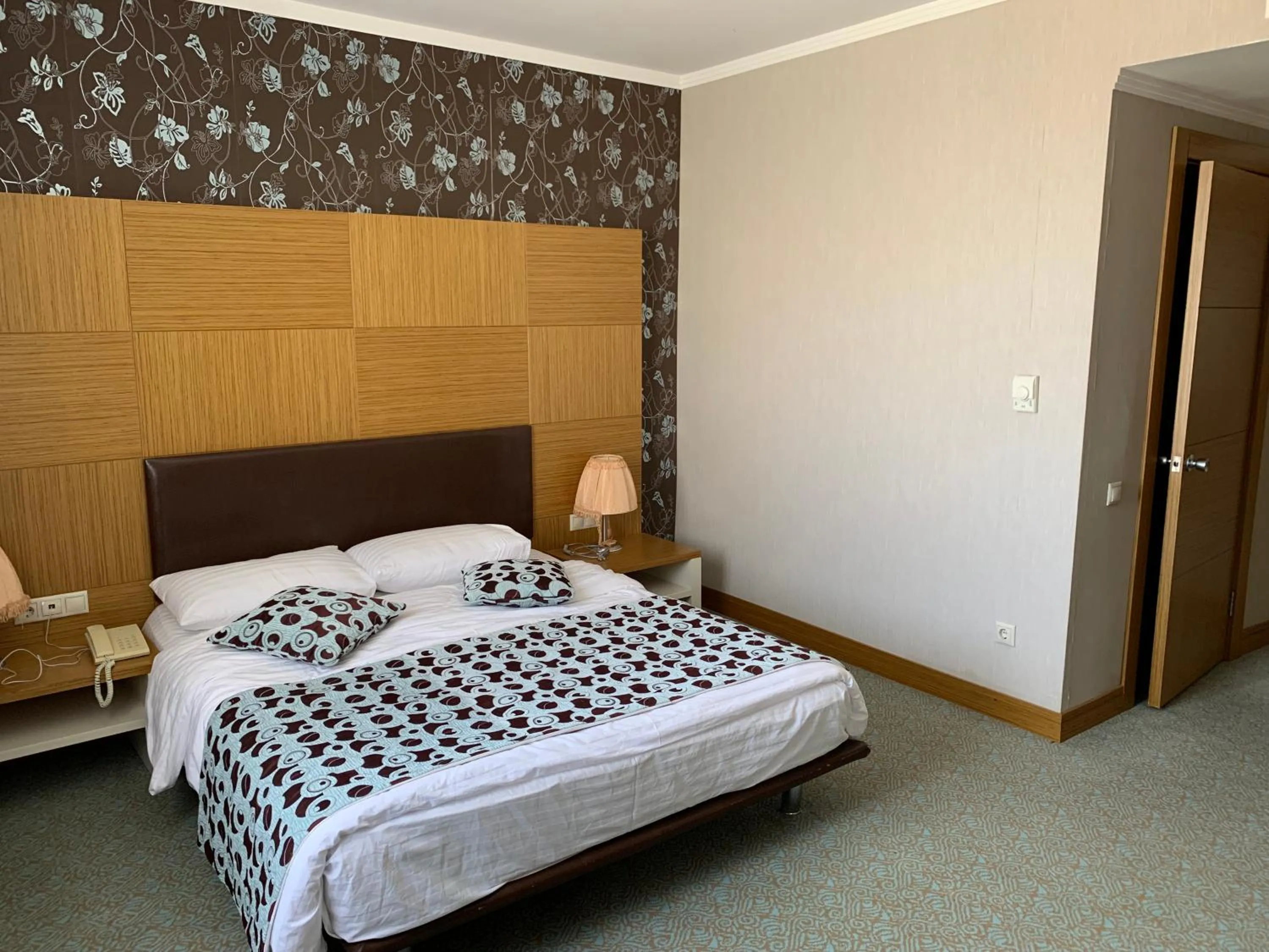 Bedroom in Grand Nur Plaza Hotel