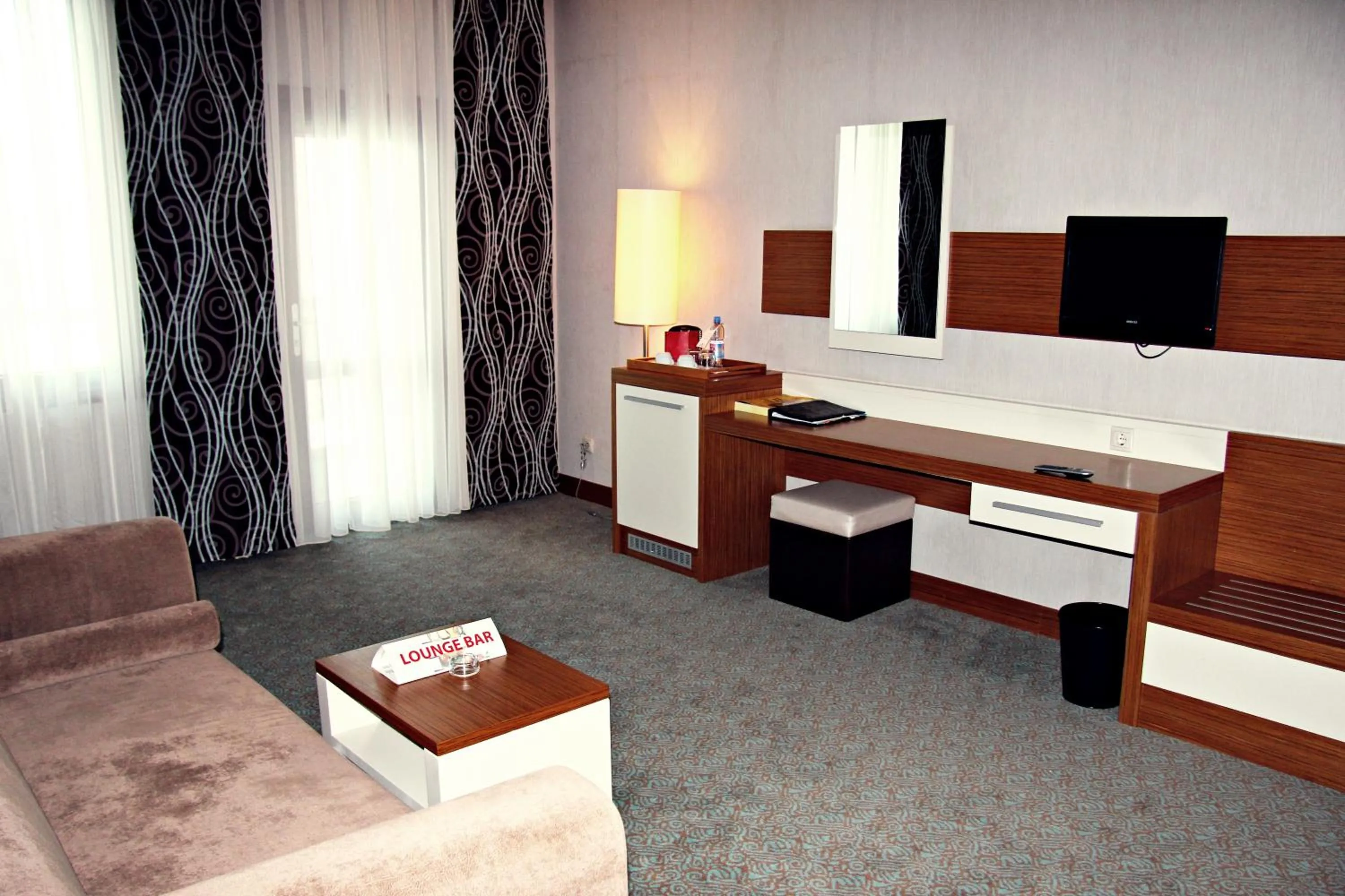 Living room in Grand Nur Plaza Hotel