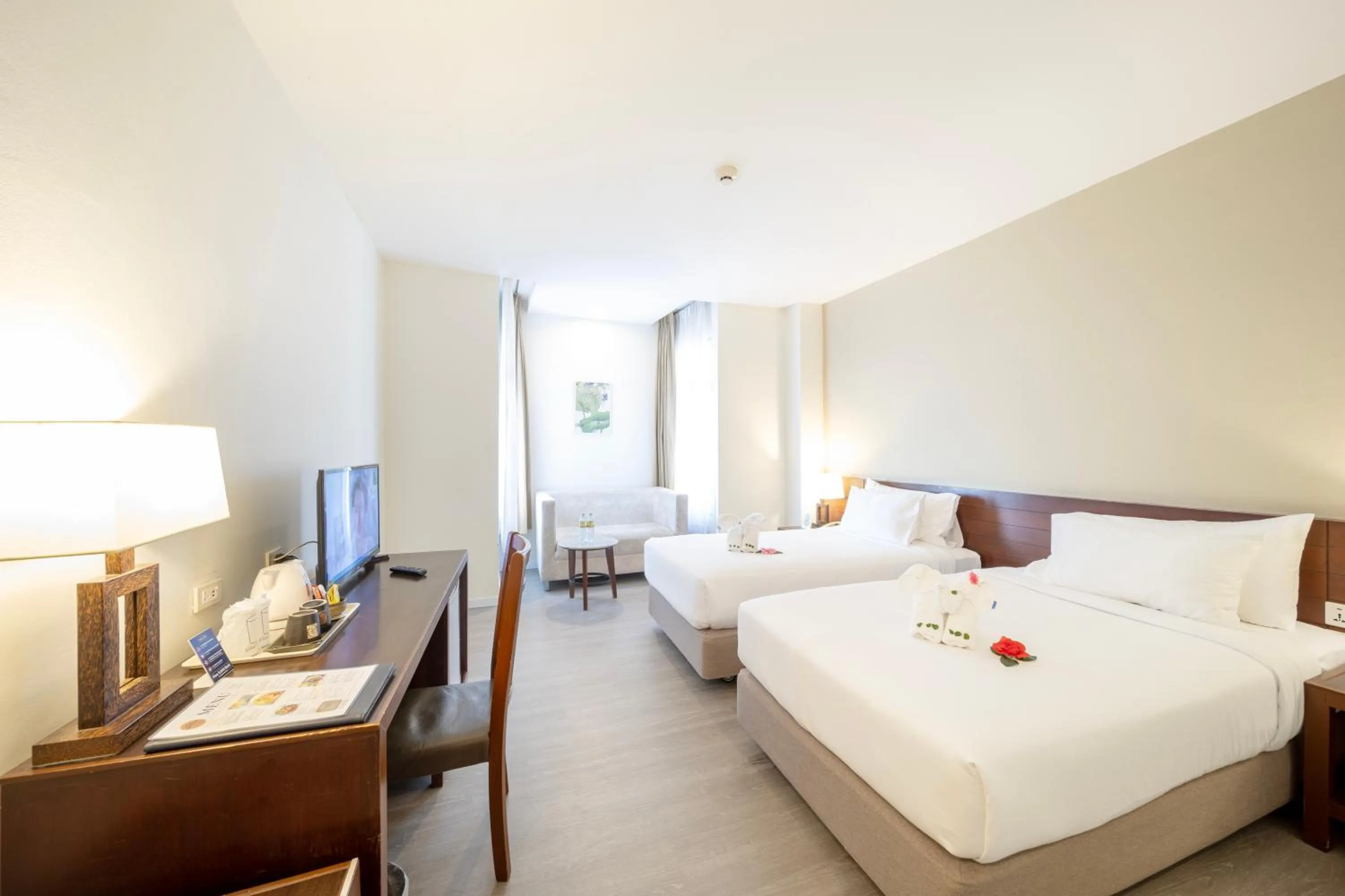 Bed in Golden Crown Grand Hotel