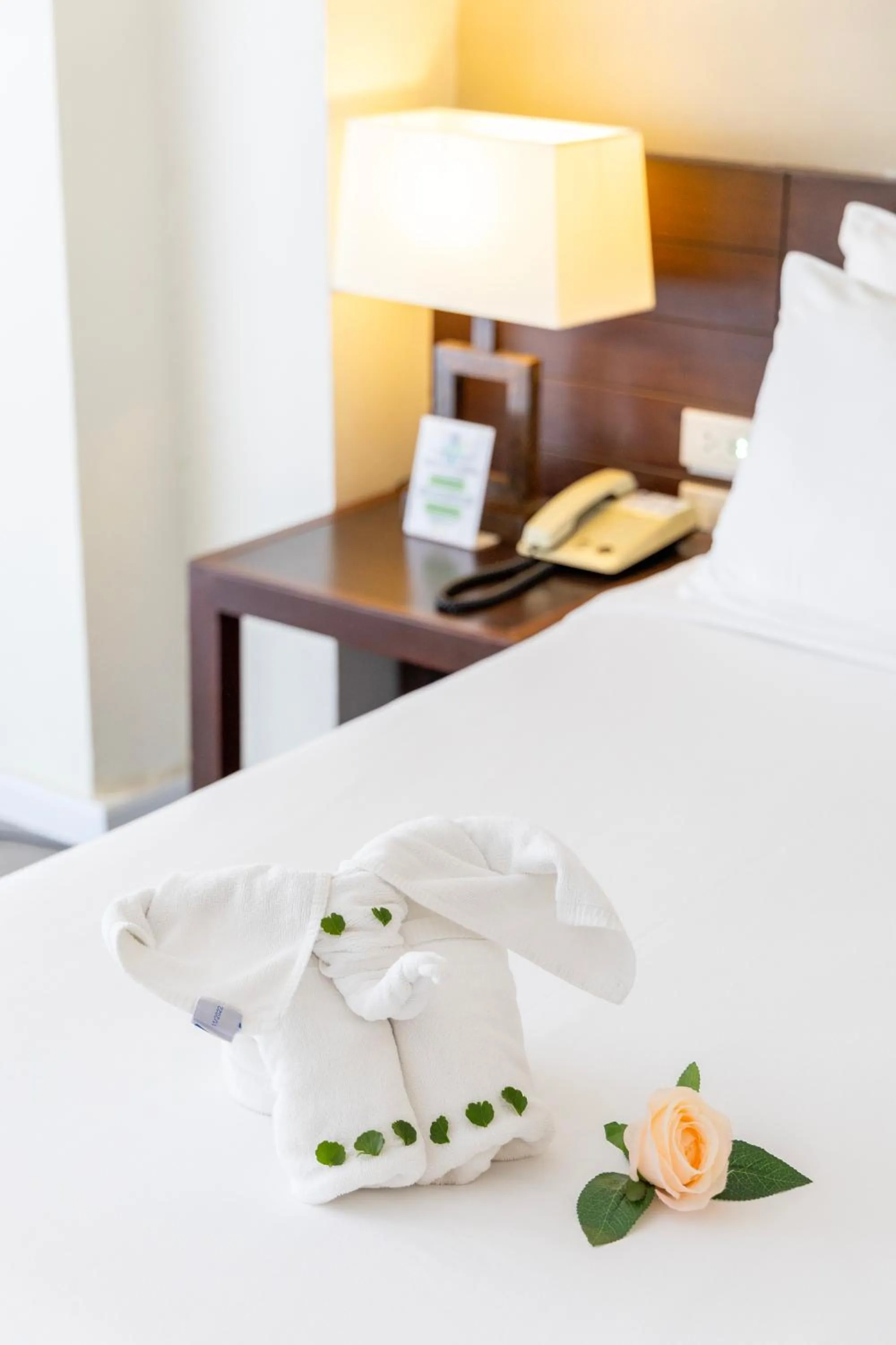 Bed in Golden Crown Grand Hotel