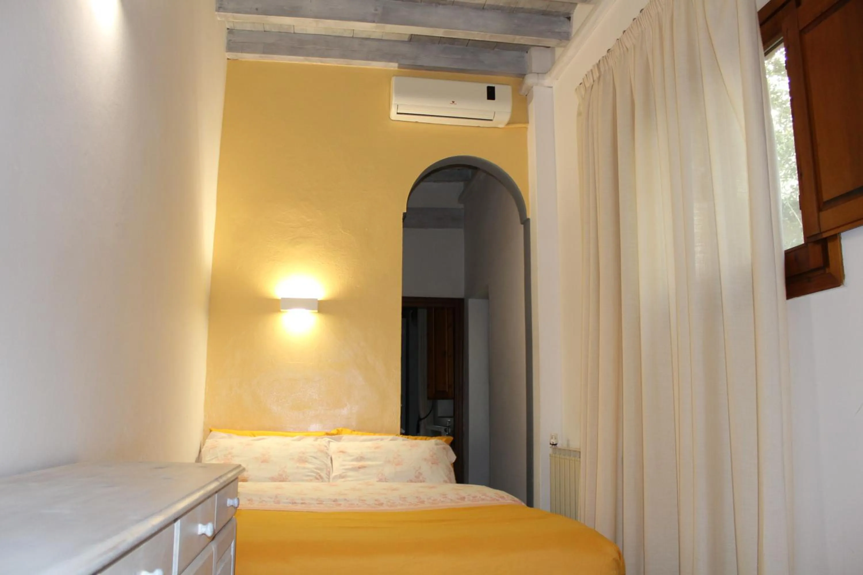 Bed in Max Apartments