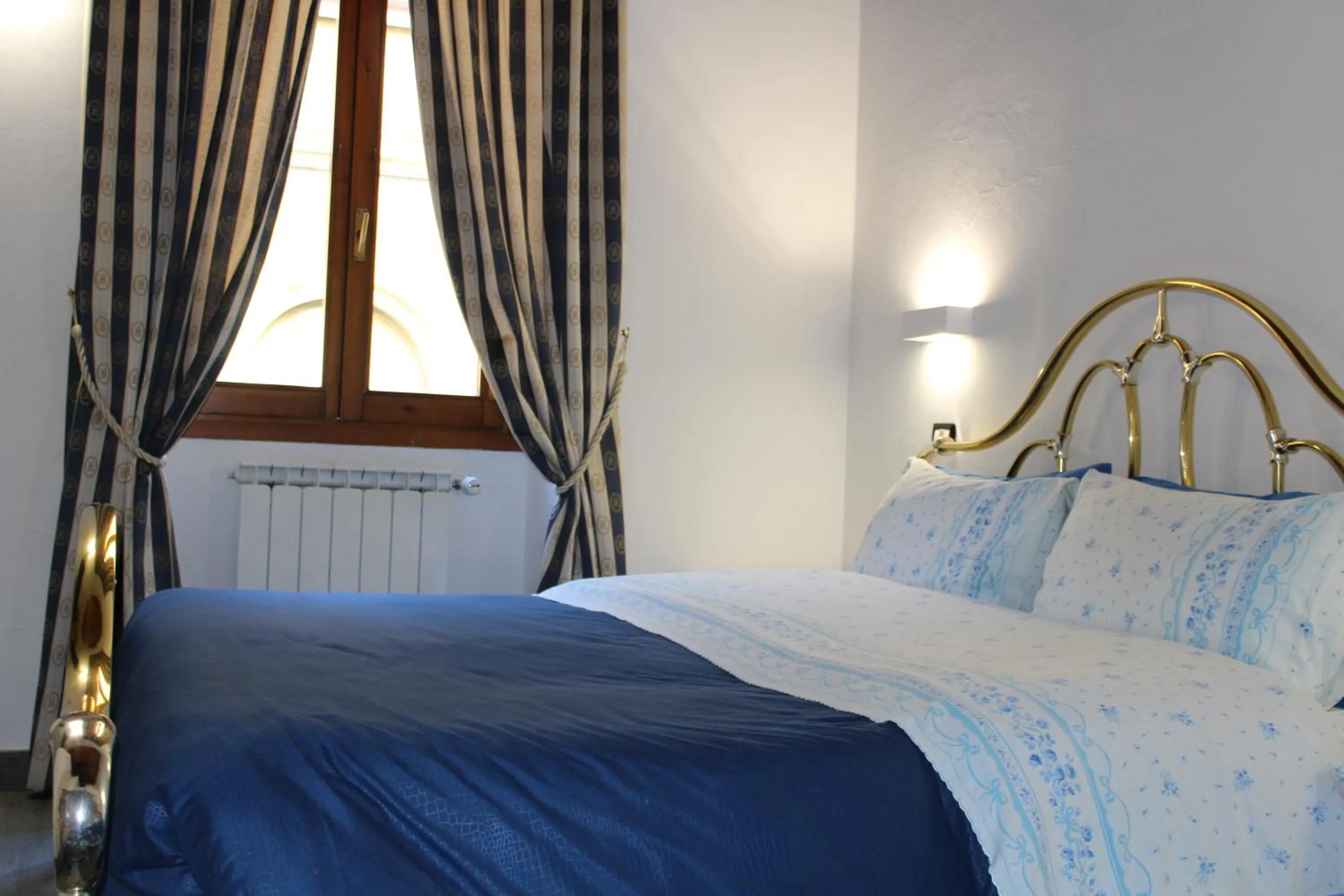 Bed in Max Apartments