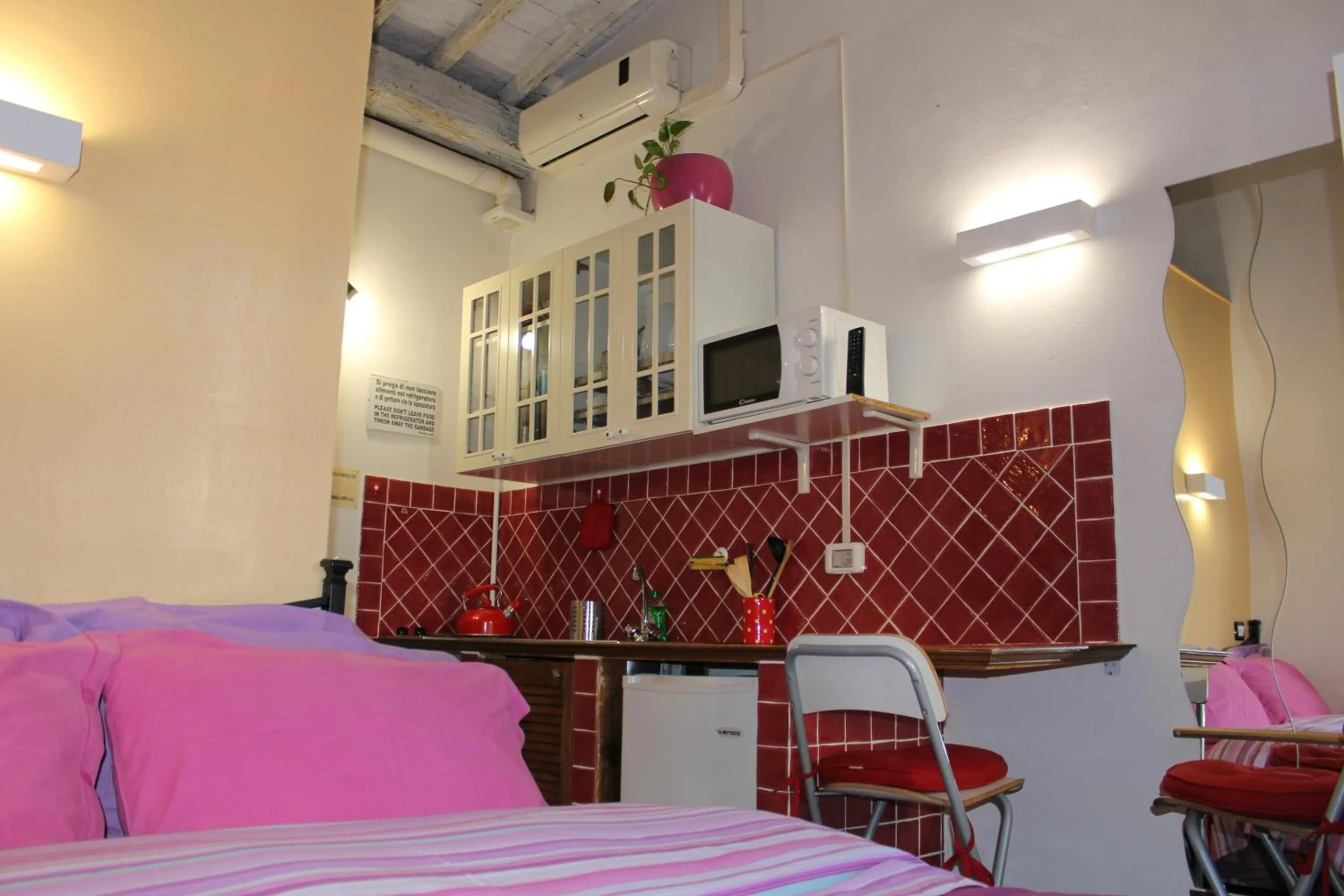 Bed in Max Apartments