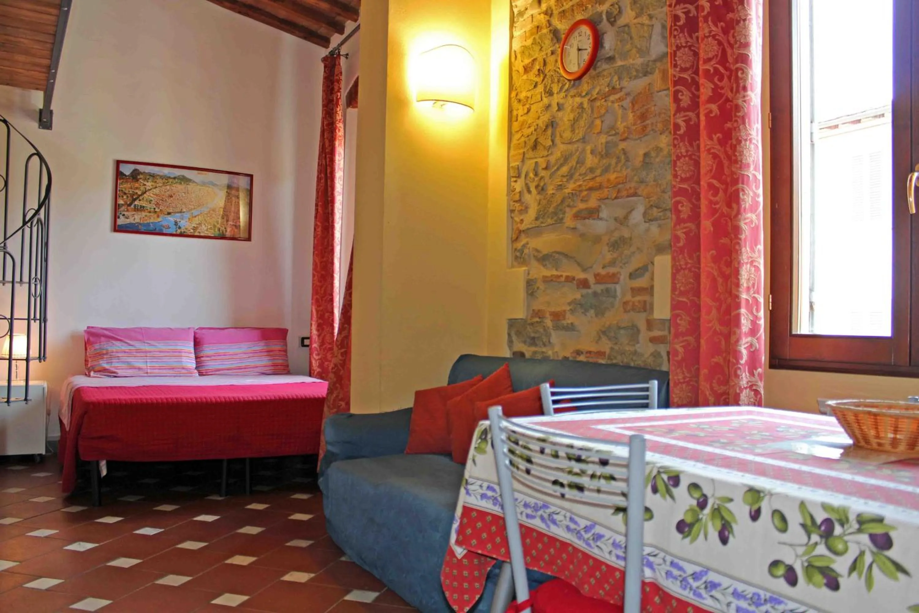 Seating area, Bed in Max Apartments