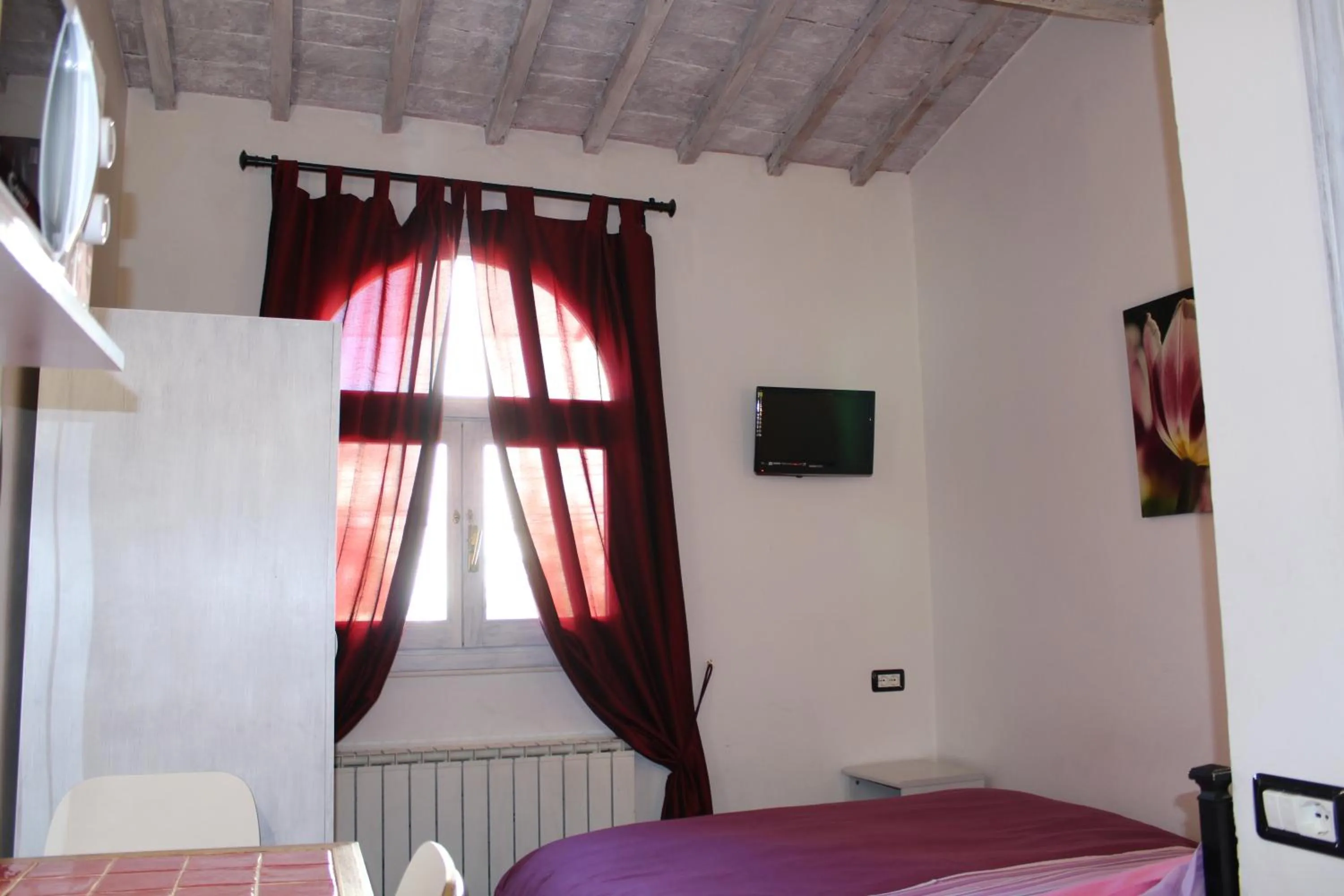 Bed in Max Apartments