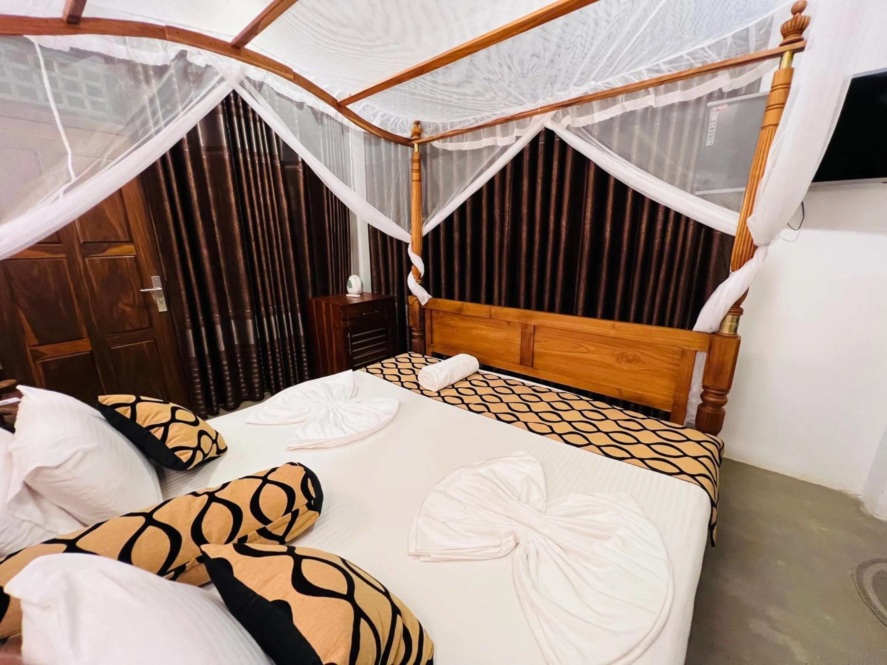 Bed in Top Secret Beach Hotel