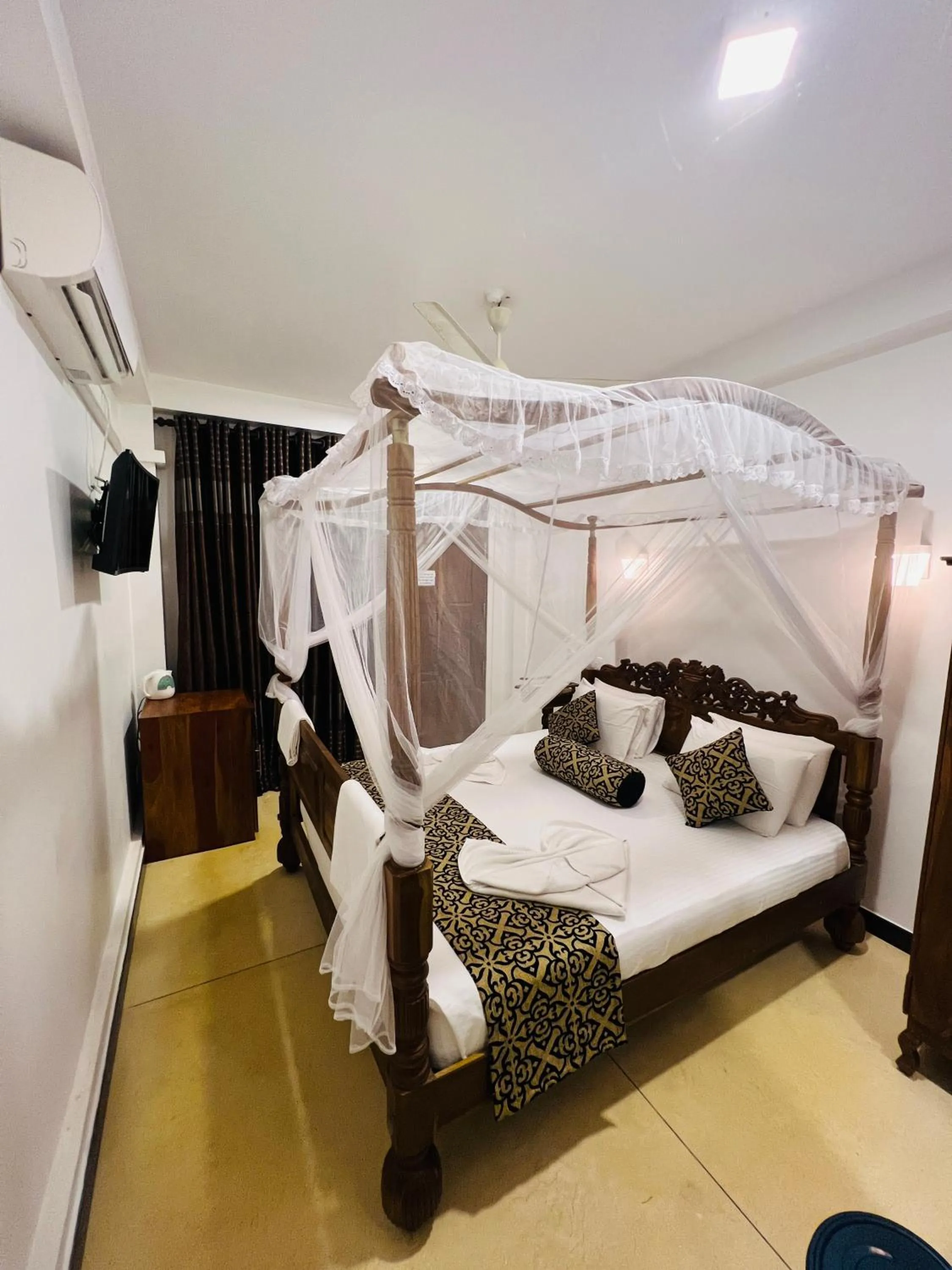 Bed in Top Secret Beach Hotel