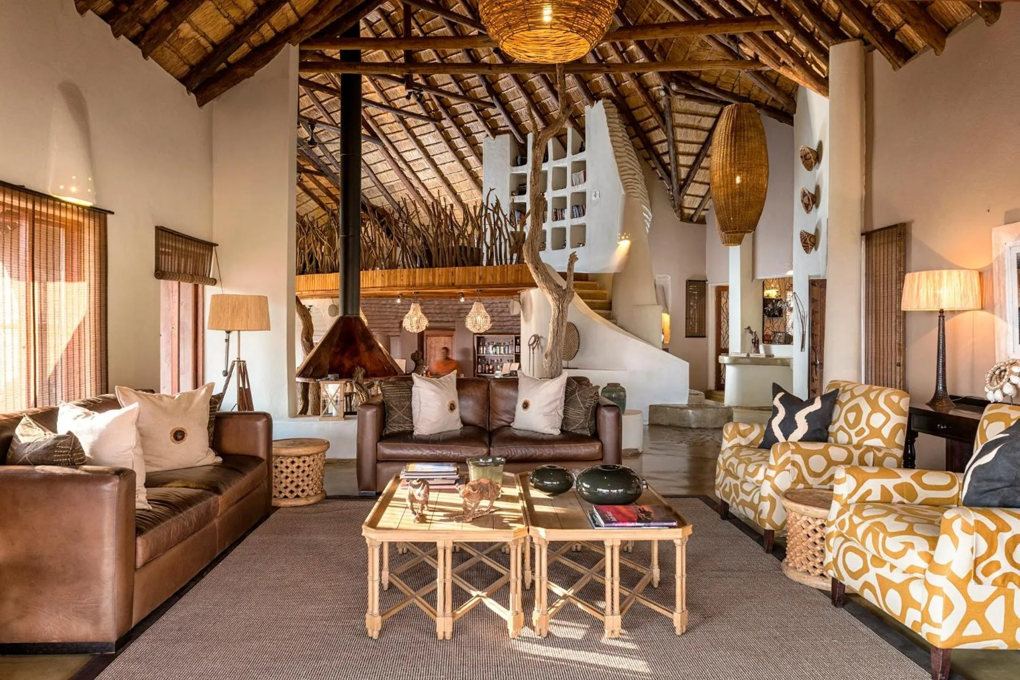 Communal lounge/ TV room in Impodimo Game Lodge