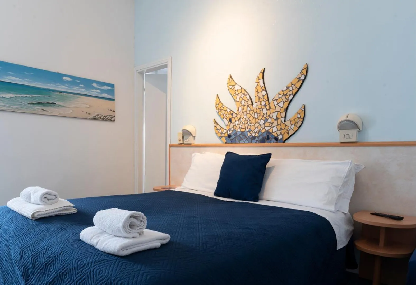 Bed in Hotel Giorgetti Orange