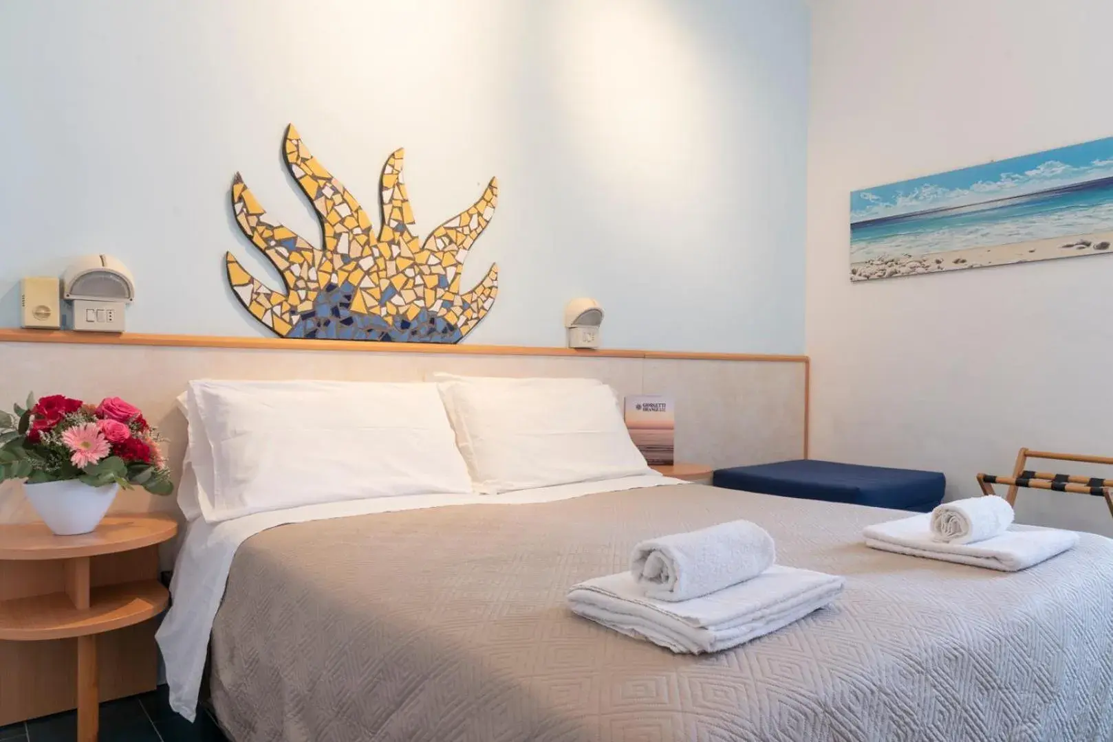 Triple Room with Balcony and Lateral Sea View in Hotel Giorgetti Orange Triple Room with Balcony and Lateral Sea View in Hotel Giorgetti Orange