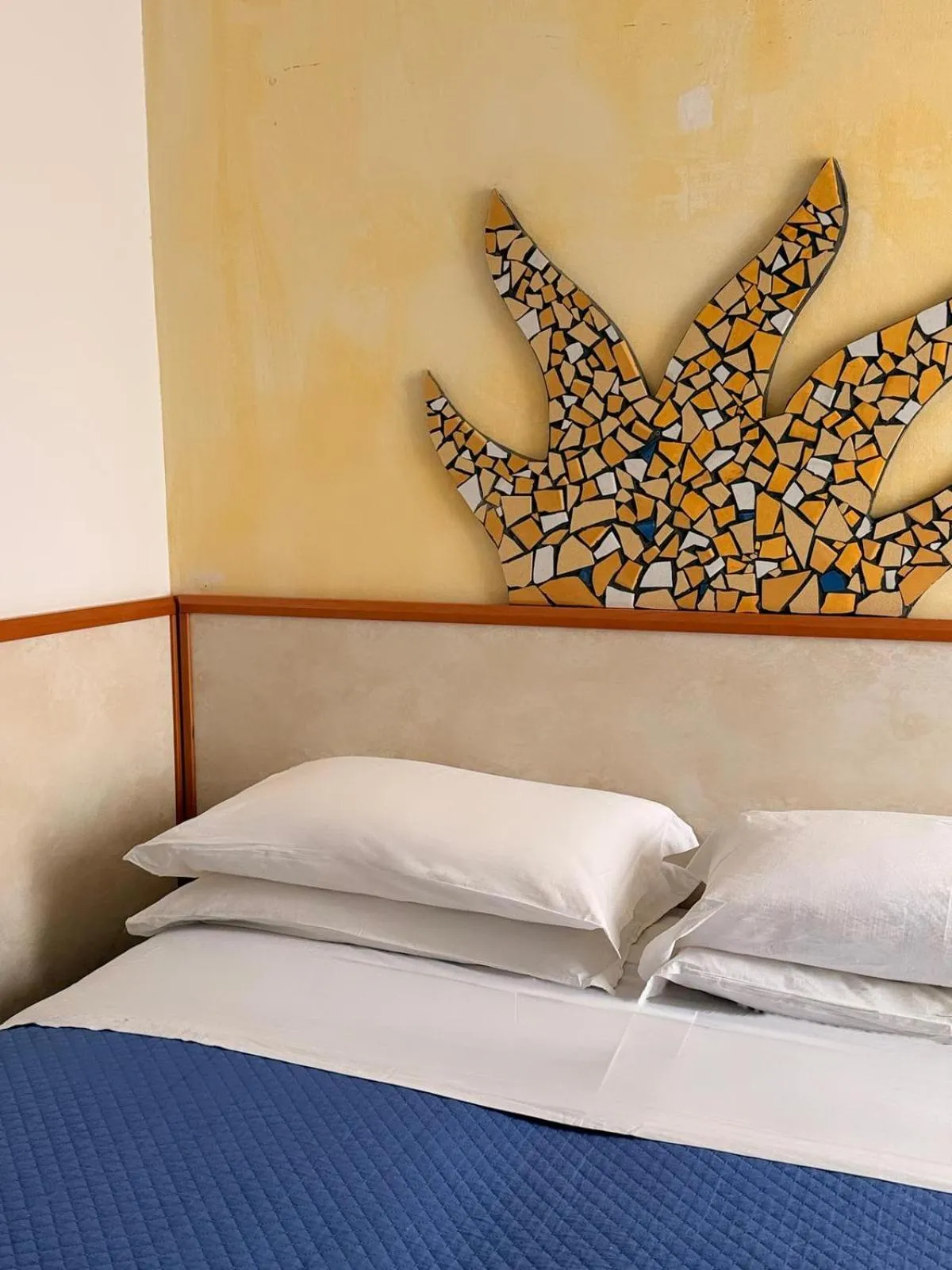 Bed in Hotel Giorgetti Orange