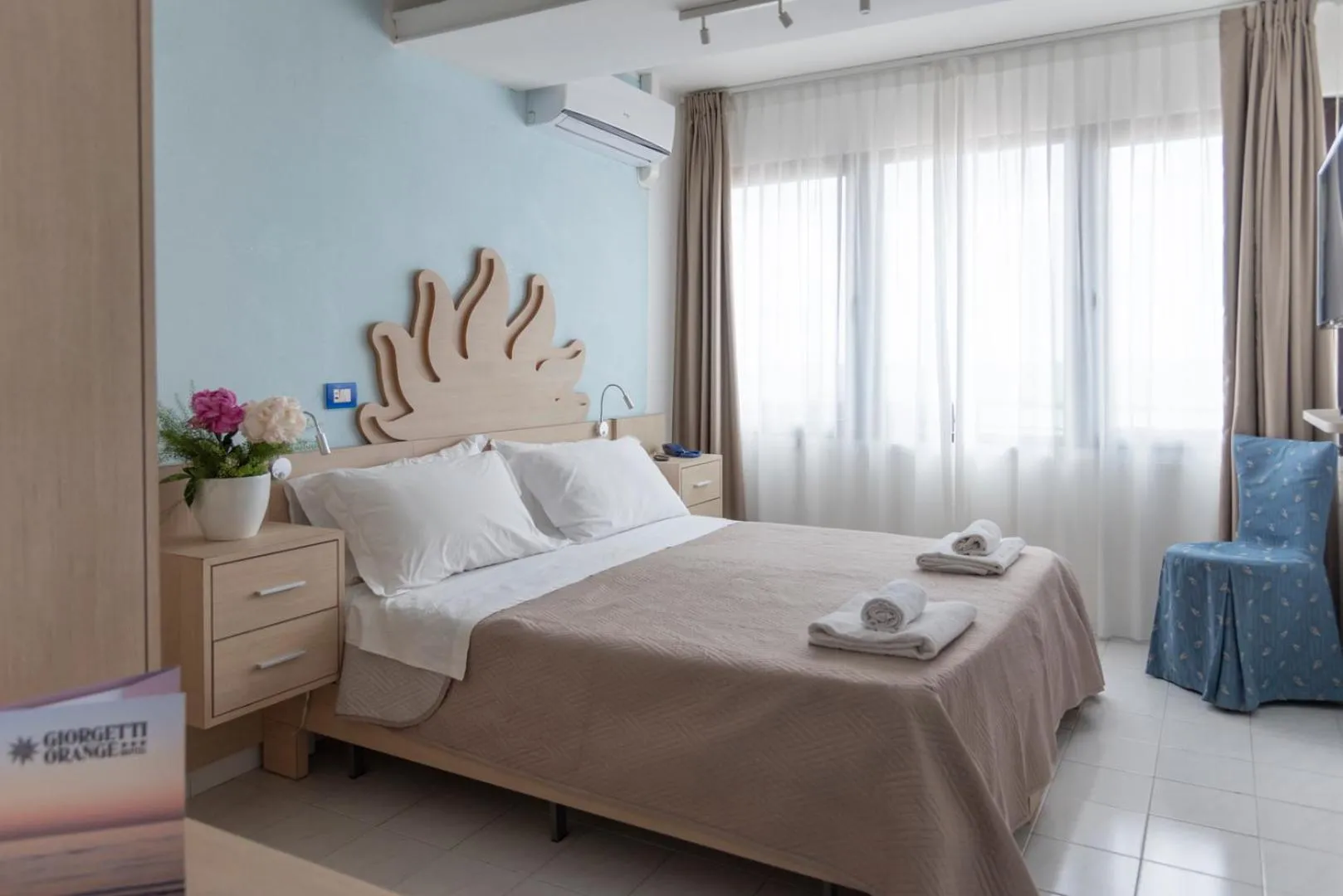 Bed in Hotel Giorgetti Orange