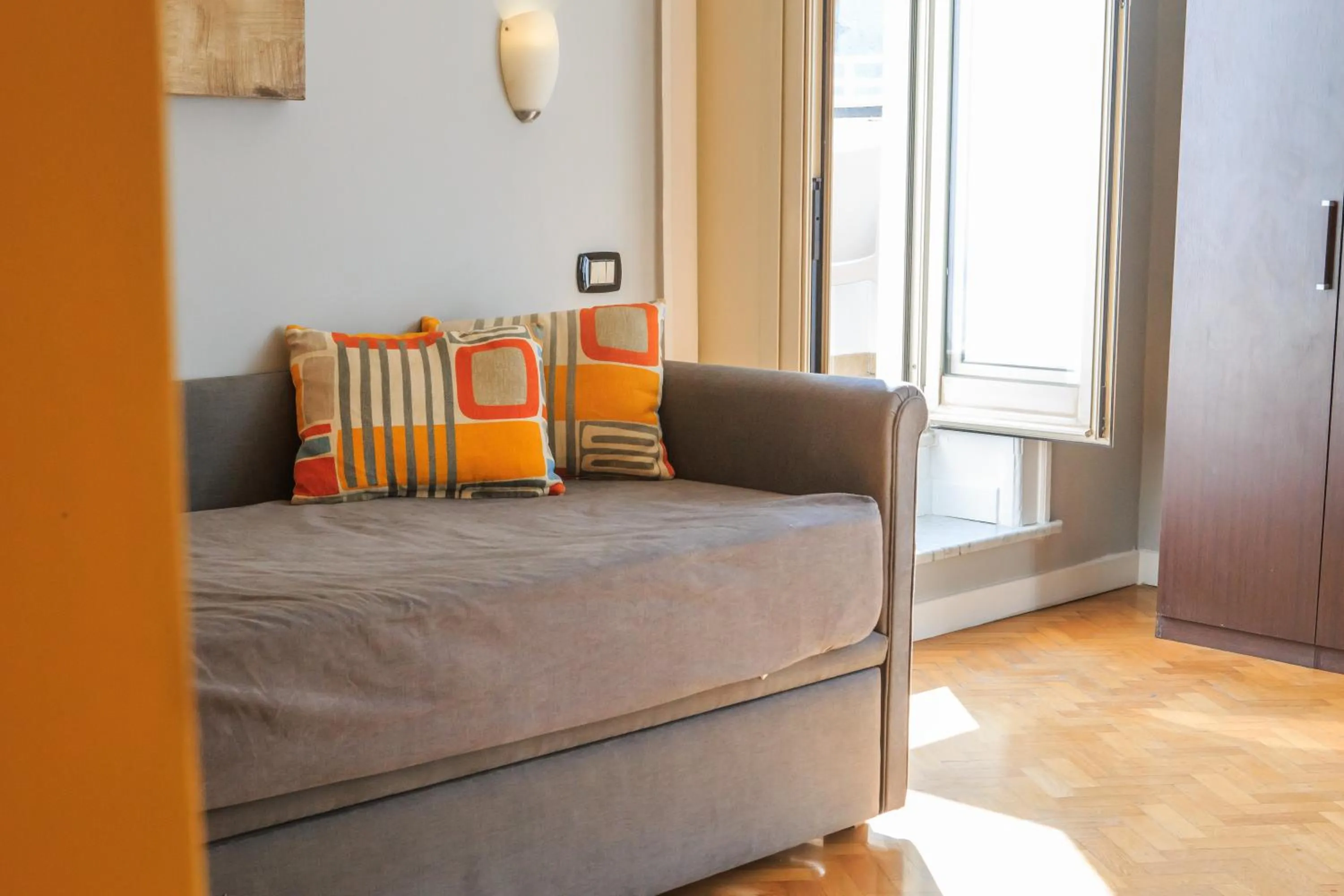 Living room, Bed in Spaccanapoli Comfort Suites